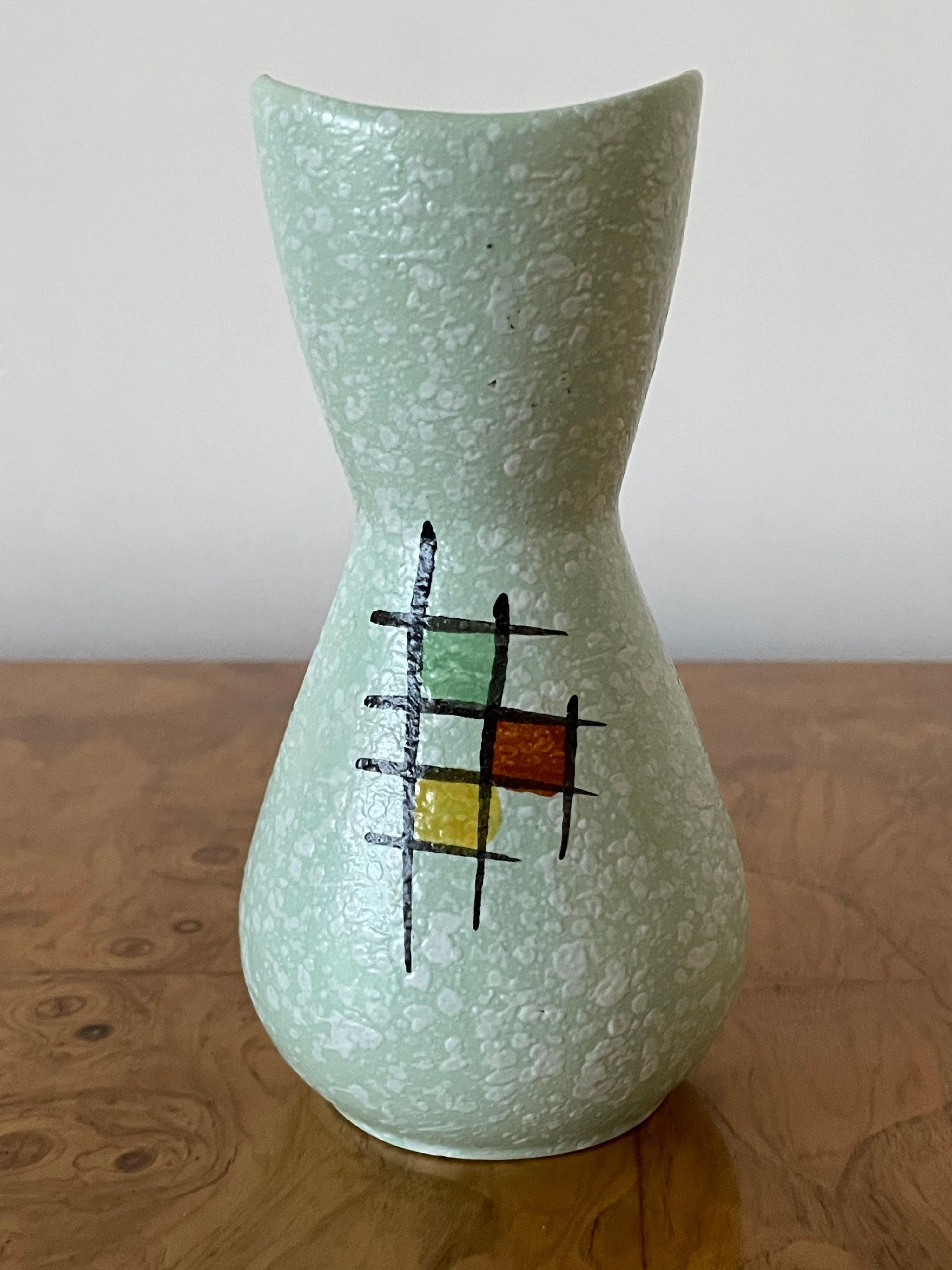 Petite Mid-Century Modern West Germany vase. Wonderful glaze and motif.