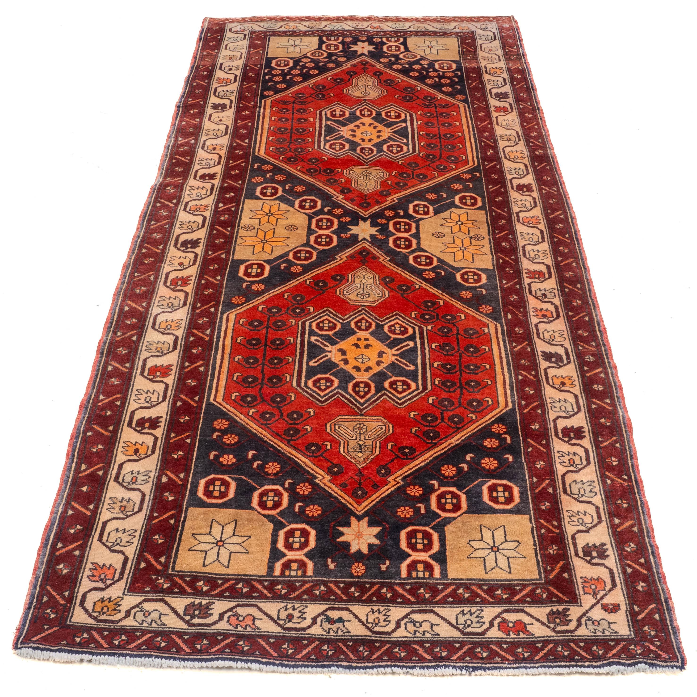 A West Persian Khelleh or long rug, approximately 9'9