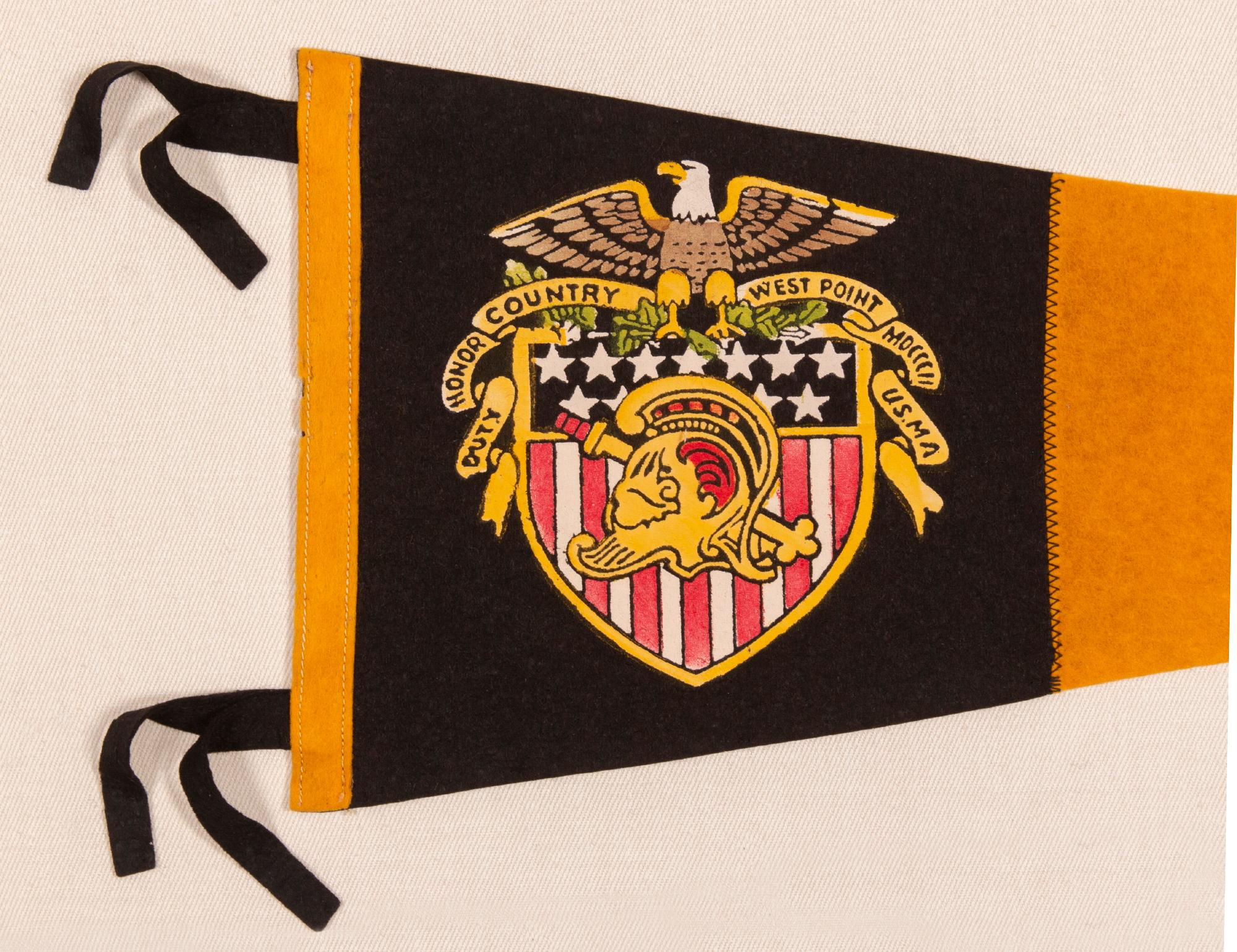 WEST POINT PENNANT WITH STRIKING COLOR & GRAPHICS, WWII ERA - 1950's

Triangular pennant, made for the United States Military Academy at West Point, with exceptional colors and graphics. Made of golden yellow and black felted wool, the Academy's