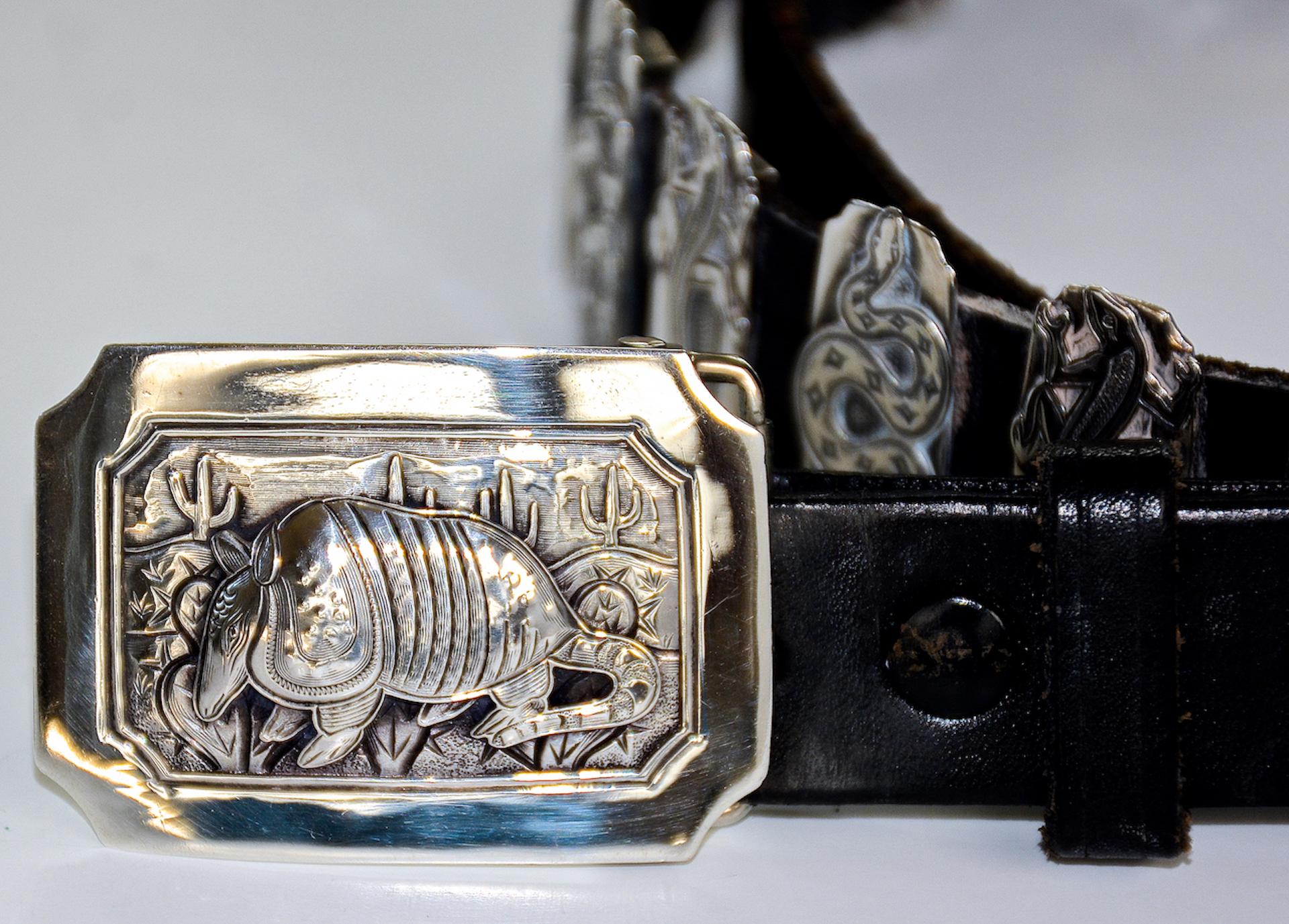 A wonderous creative take on the traditional Concho Belt by renown artist and jeweler Kit Carson. He has mastered the art of stylistic blending of Western, Texan, and Native American genres with this unique belt.

The belt is 50 inches in length