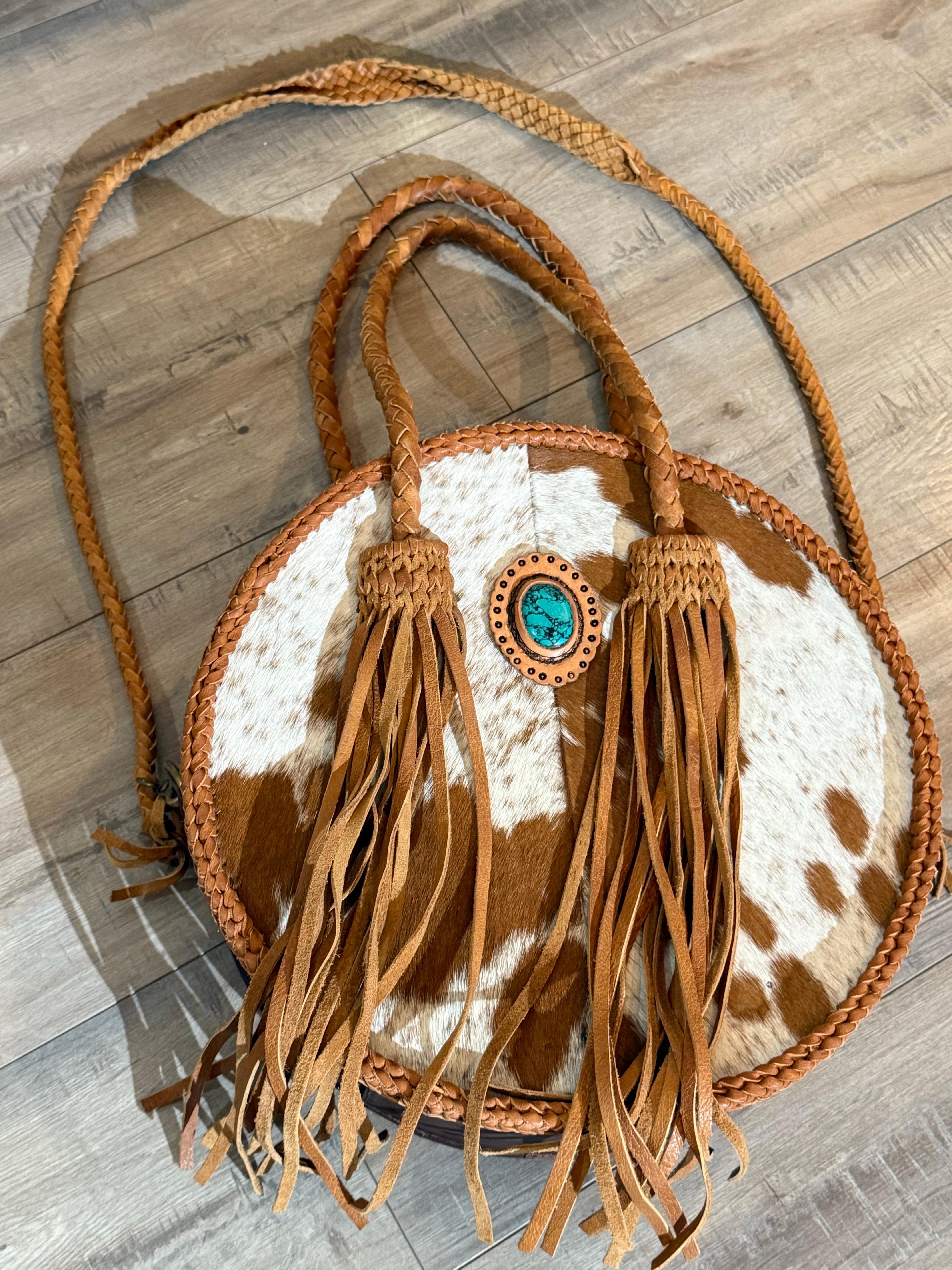 Western-Styled Cowhide Drum Handbag w Braid Handles and Leather Tassels For Sale 9