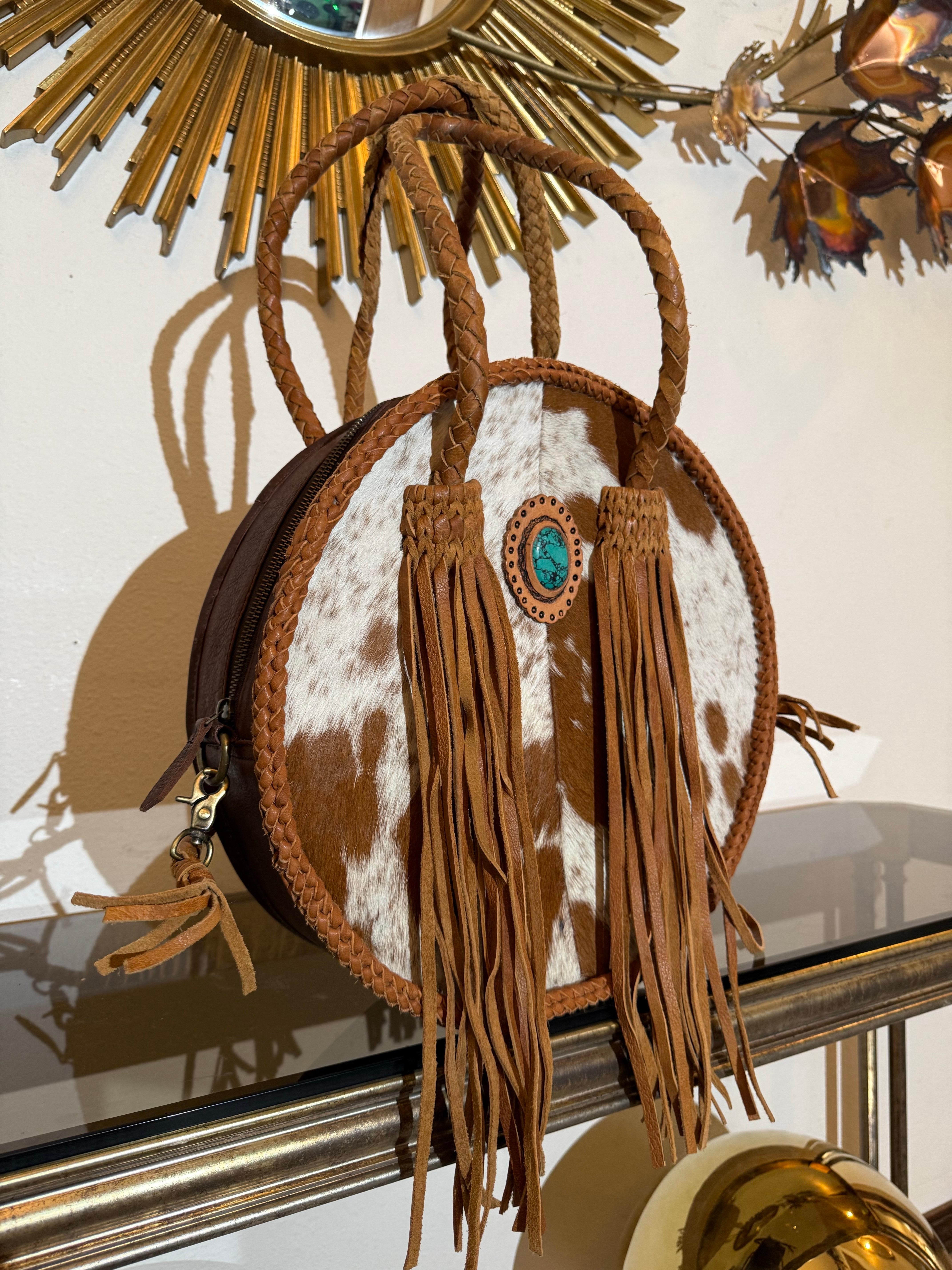 Western-Styled Cowhide Drum Handbag w Braid Handles and Leather Tassels For Sale 1