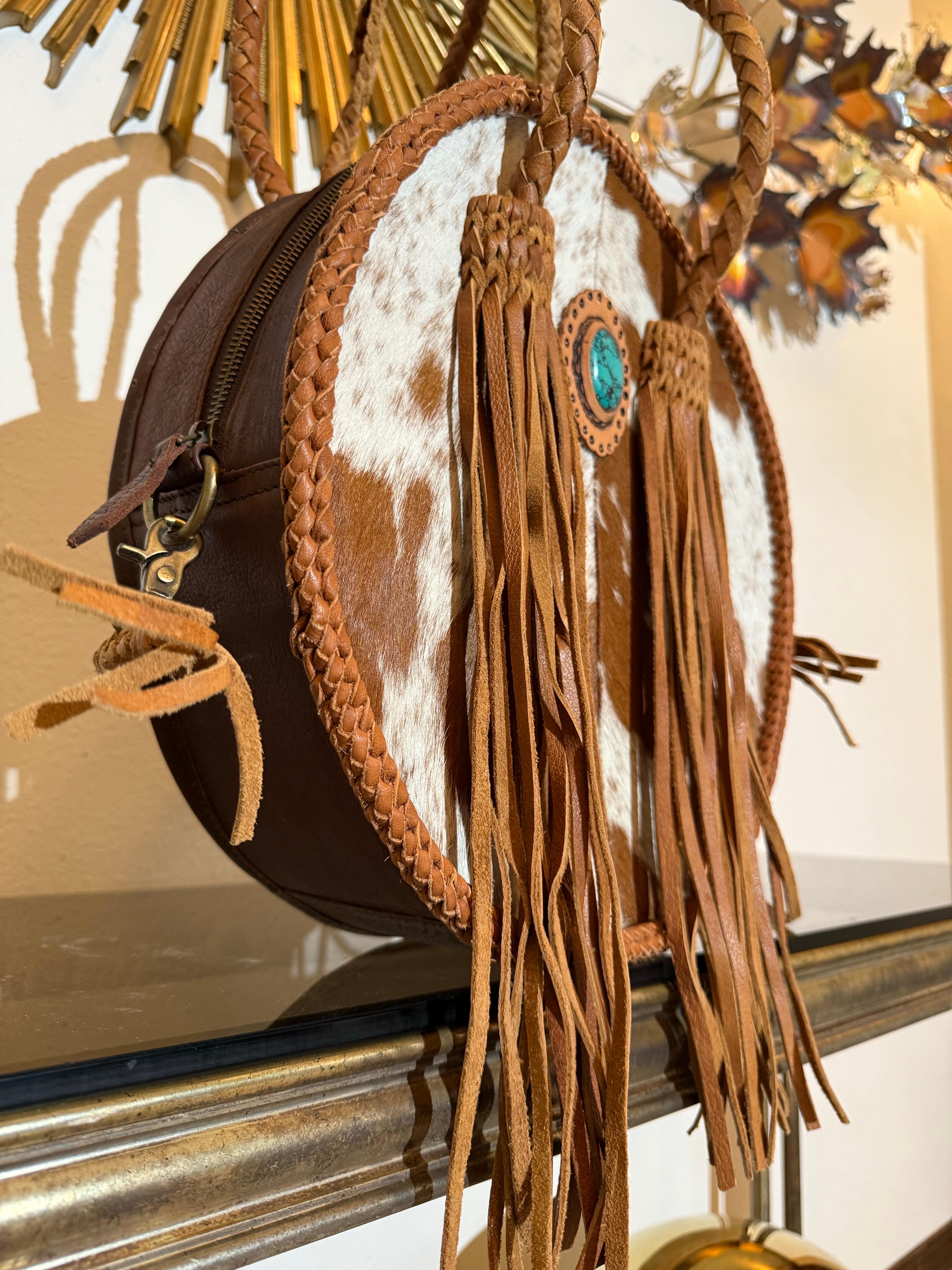 Western-Styled Cowhide Drum Handbag w Braid Handles and Leather Tassels For Sale 2
