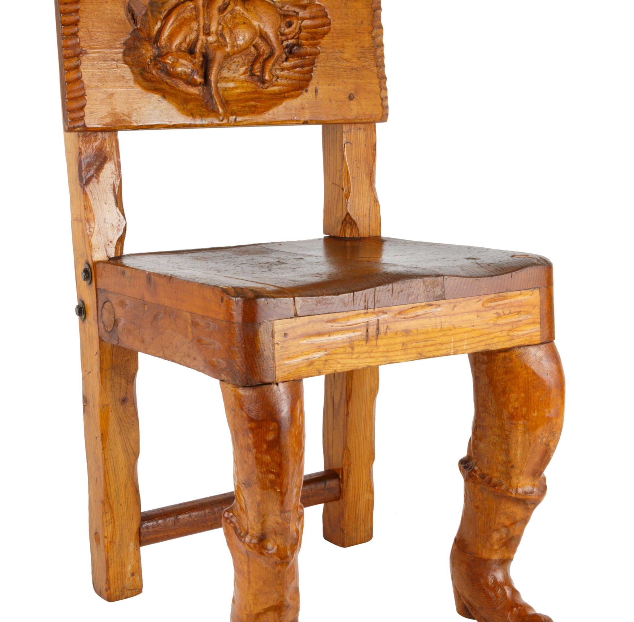 Wooden child's chair feature wooden front feet carved resemble cowboy boots and relief carving of a bucking bronco on chair back. Maker unknown.

Period: First Half of the 20th Century

Origin: Western United States

Size: 13