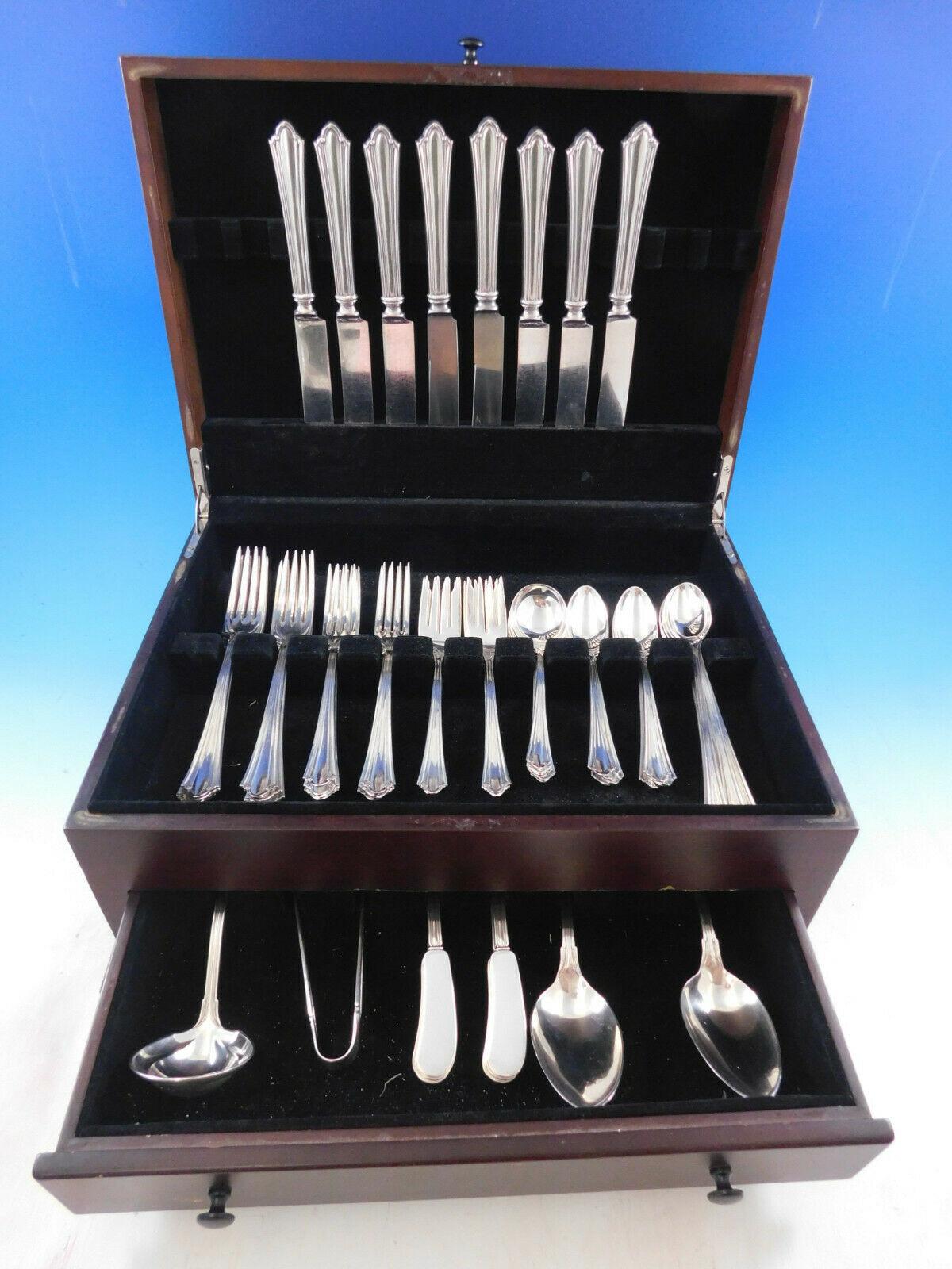 Dinner size westminster by International sterling silver flatware set - 68 pieces. This set includes:

8 dinner size knives, 9 1/2