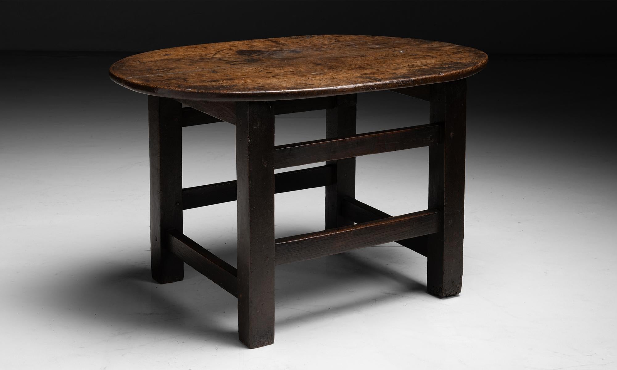 Westmorland Oak Low Table
England circa 1780

2 plank oval Top with support stretchers. Original stain and patina.

36.5”L x 25”d x 22.75”h