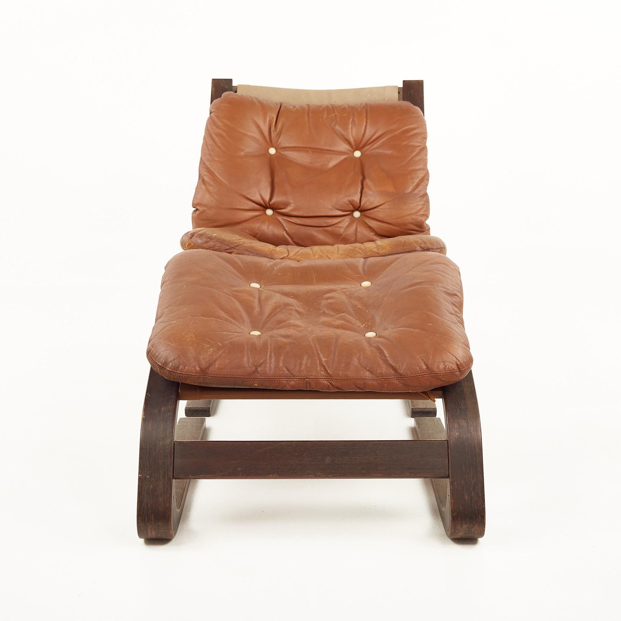 Westnofa Mid Century Bentwood Brown Leather Siesta chair with ottoman

The chair measures: 24 wide x 30 deep x 30 high, with a seat height of 18 inches

All pieces of furniture can be had in what we call restored vintage condition. That means