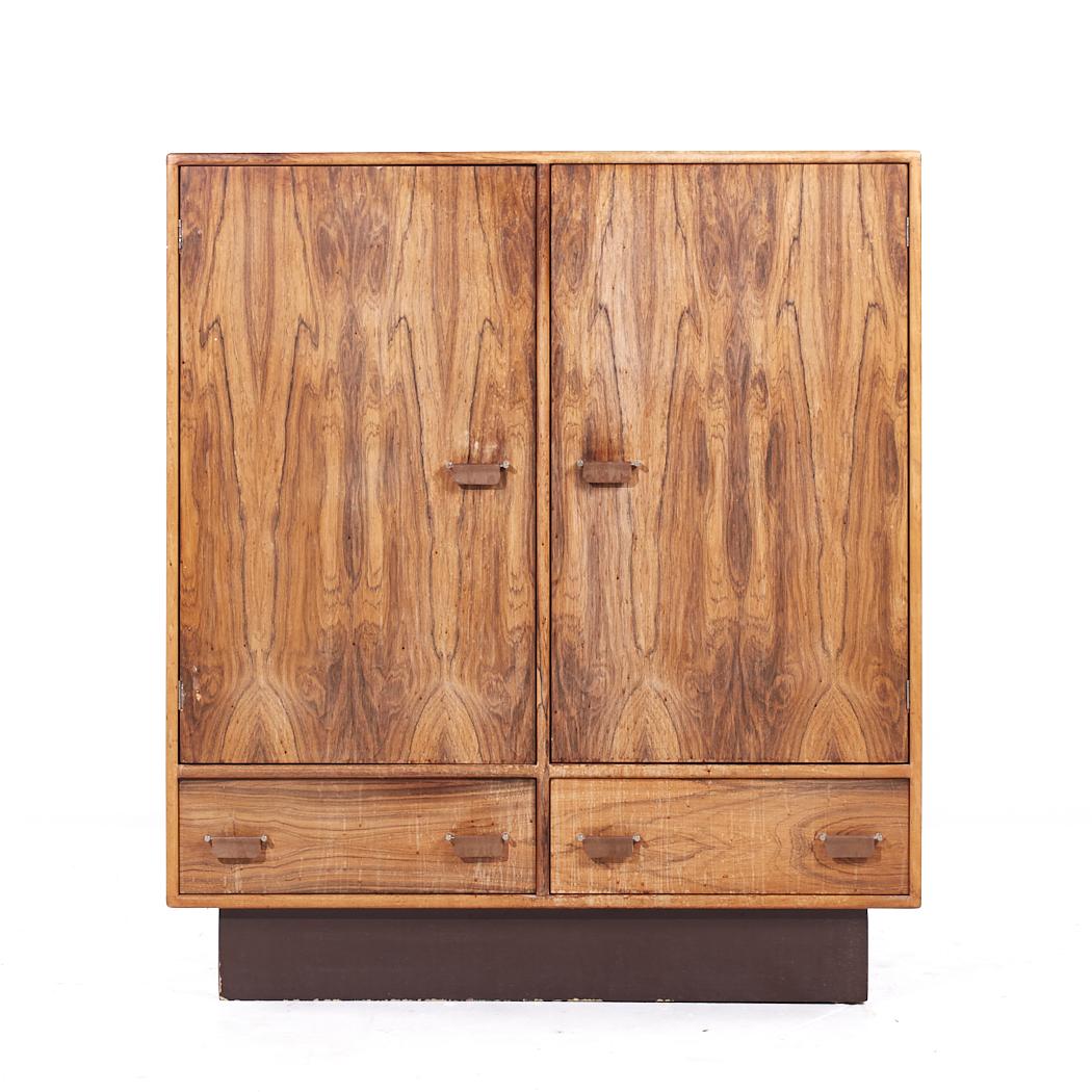 Westnofa Mid Century Danish Rosewood Armoire

This armoire measures: 42 wide x 18 deep x 47.5 inches high

All pieces of furniture can be had in what we call restored vintage condition. That means the piece is restored upon purchase so it’s free of