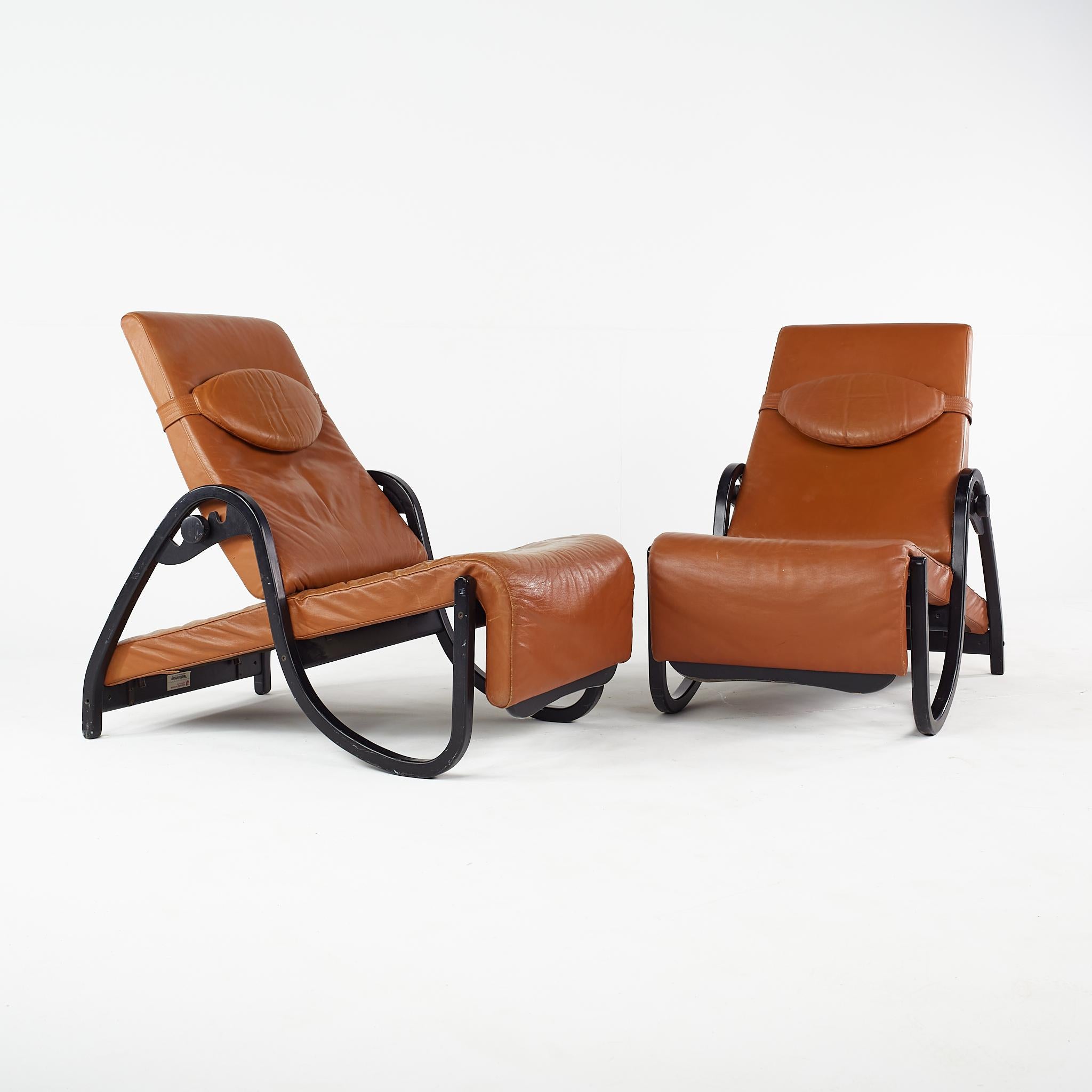 Westnofa Mid Century Leather Reclining Lounge Chairs - Pair

The chair measures: 25 wide x 42 deep x 30.5 high, with a seat height of 17 inches

All pieces of furniture can be had in what we call restored vintage condition. That means the piece is