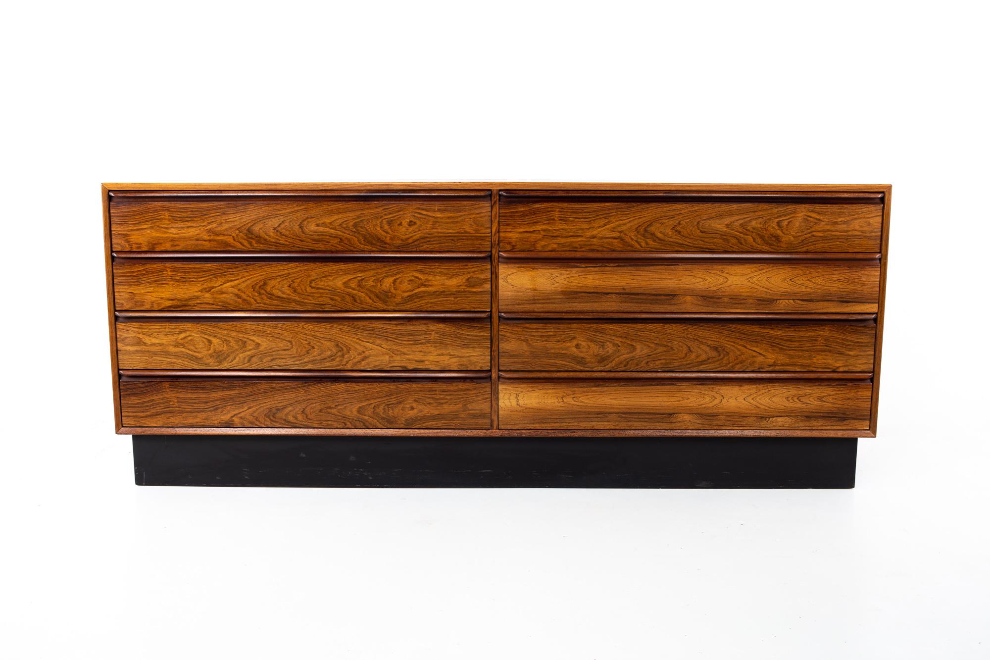 Westnofa Mid Century rosewood 8 drawer lowboy dresser
Dresser measures: 71.5 wide x 18 deep x 29 inches high

This price includes getting this piece in what we call restored vintage condition. That means the piece is permanently fixed upon purchase