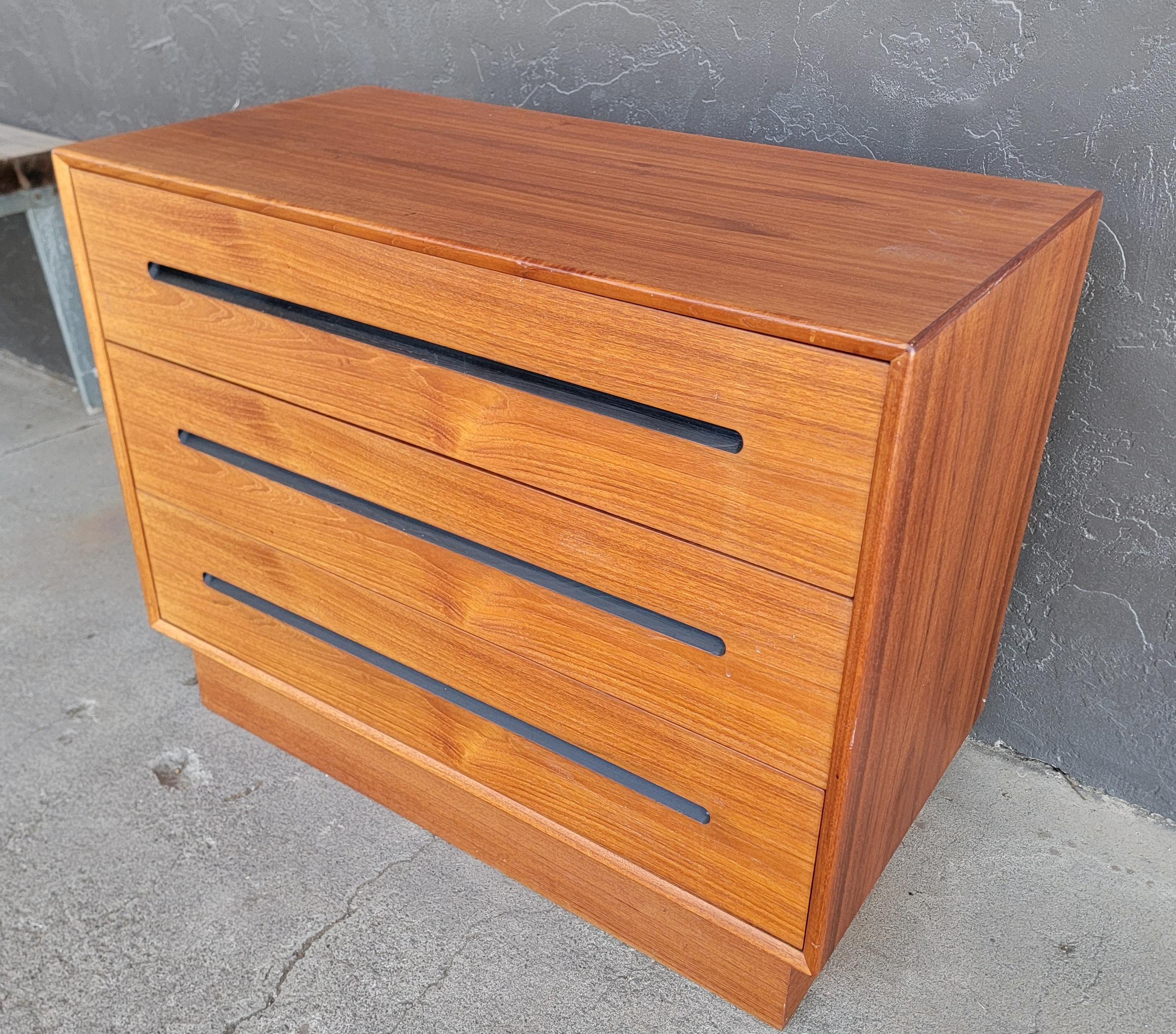 Westnofa 3 drawer dresser. Circa. 1960's . Classic Danish Modern styling. Very nice glow to patina on original finish. Drawers glide easily and drawer interiors are very clean. Retains Westnofa label on back. Diminutive size could also be used as a