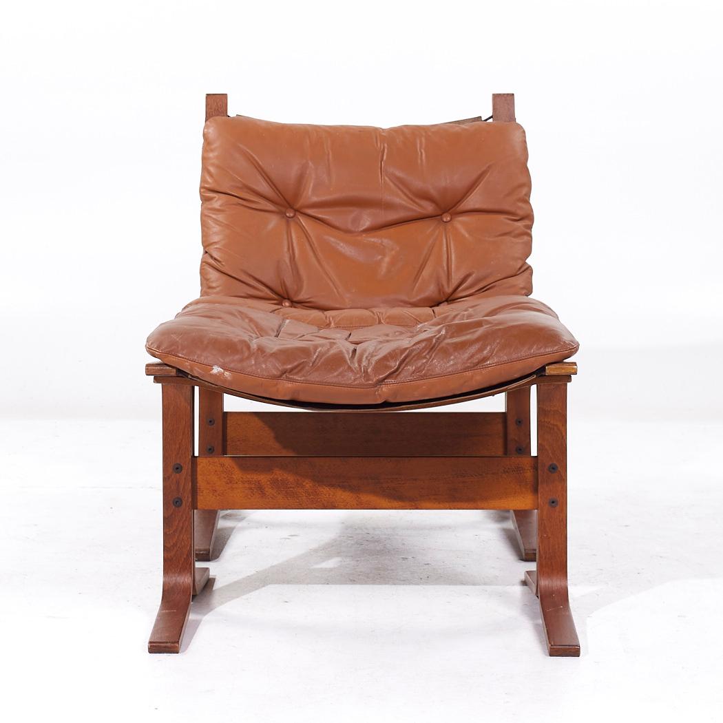 Westnofa Siesta Mid Century Bentwood and Leather Lounge Chair and Ottoman

The chair measures: 25 wide x 32 deep x 32 high, with a seat height of 18 inches
The ottoman measures: 25 wide x 21 deep x 18 inches high

All pieces of furniture can be had