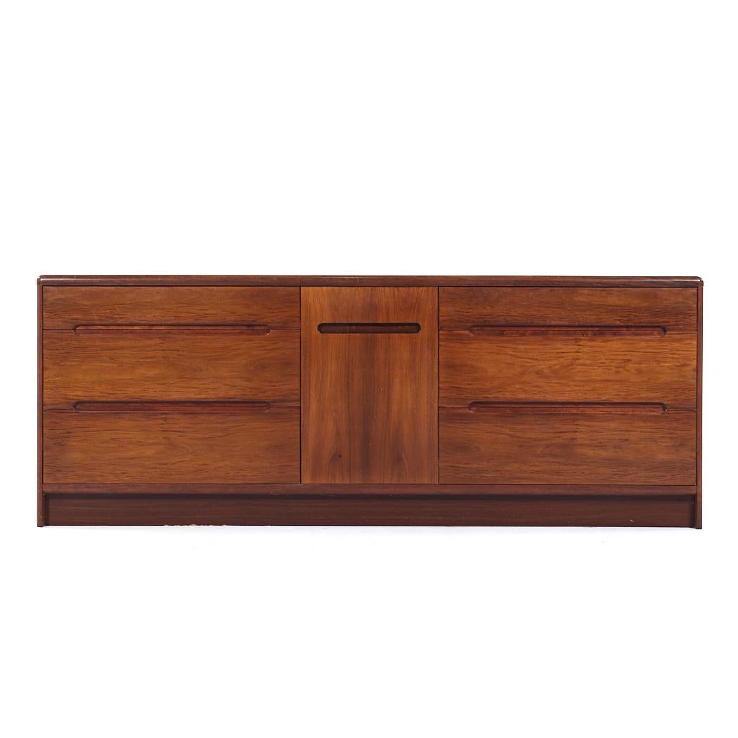 Westnofa Style Mid Century Danish Rosewood Lowboy Dresser

This lowboy measures: 76.5 wide x 19.75 deep x 29 inches high

All pieces of furniture can be had in what we call restored vintage condition. That means the piece is restored upon purchase