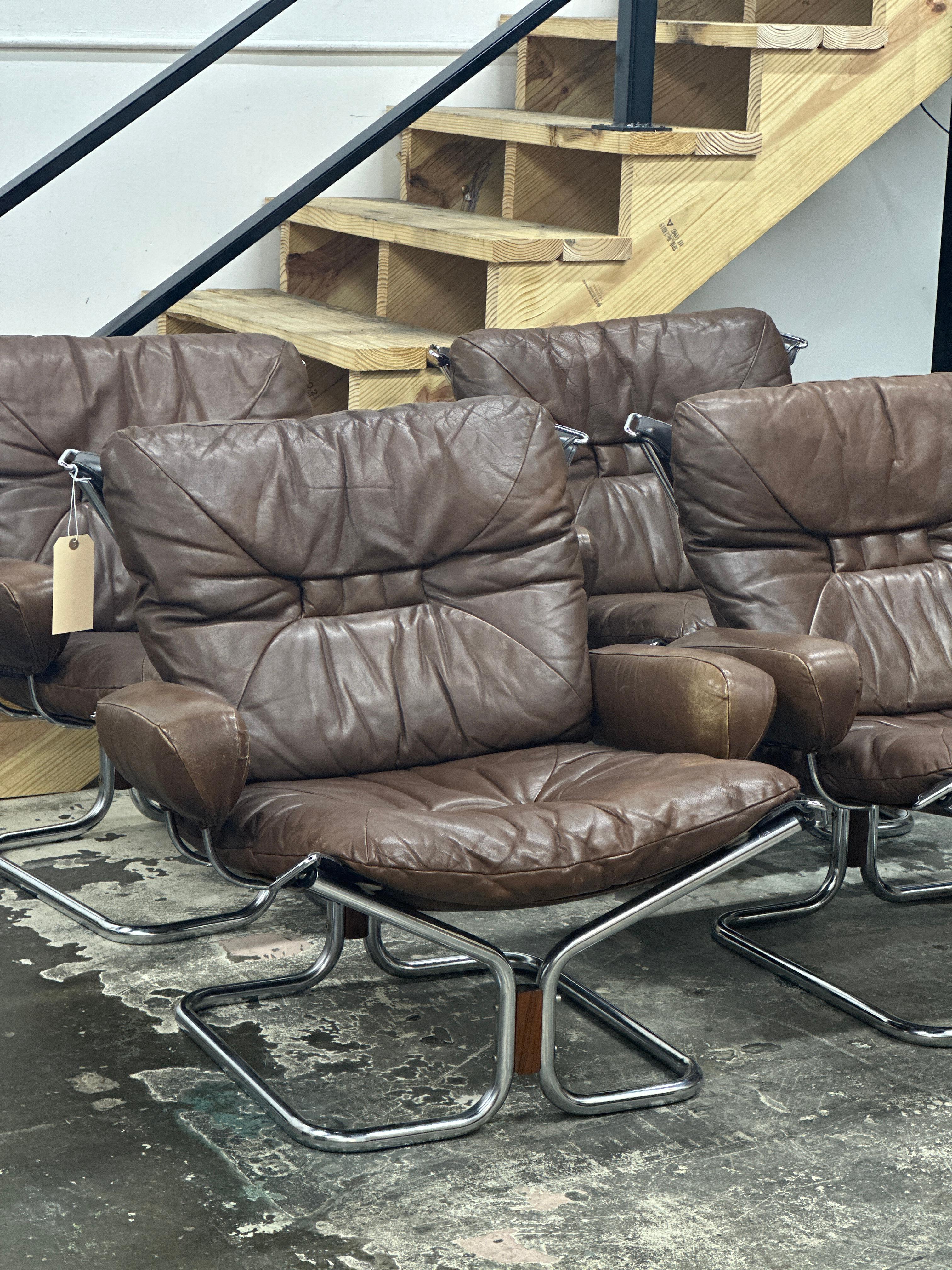 Leather armchair by Harald Relling and made by Westnofa. each chair has minor wear, and the leather is extremely soft. No rust nor pitting on chrome.

Listing is for ONE chair. No ottoman. 

Four total chairs available.