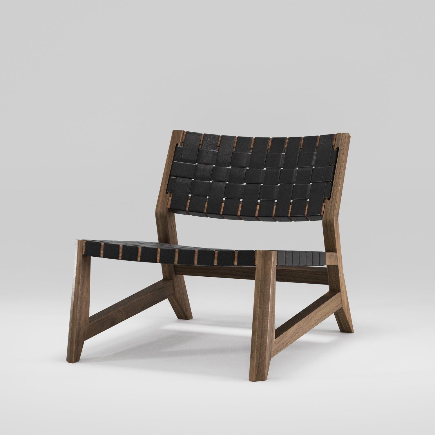 Inspired by 1950's Danish design, Odhin is an elegant yet comfortable lounge chair.

The structure in solid wood, the seat with interlaced leather straps and the details of the joints ensure the strength and resistance of this piece.

A chair to