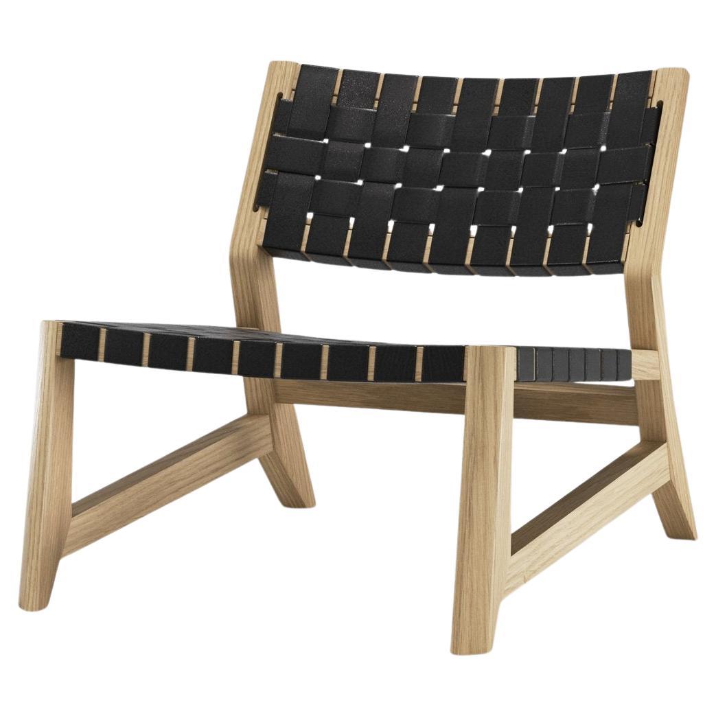 Inspired by 1950's Danish design, Odhin is an elegant yet comfortable lounge chair.

The structure in solid wood, the seat with interlaced leather straps and the details of the joints ensure the strength and resistance of this piece.

A chair to
