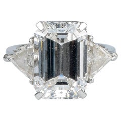 Vintage WGI certified 10.70 carat emerald cut diamond - 1.40 carat trillion cut diamonds