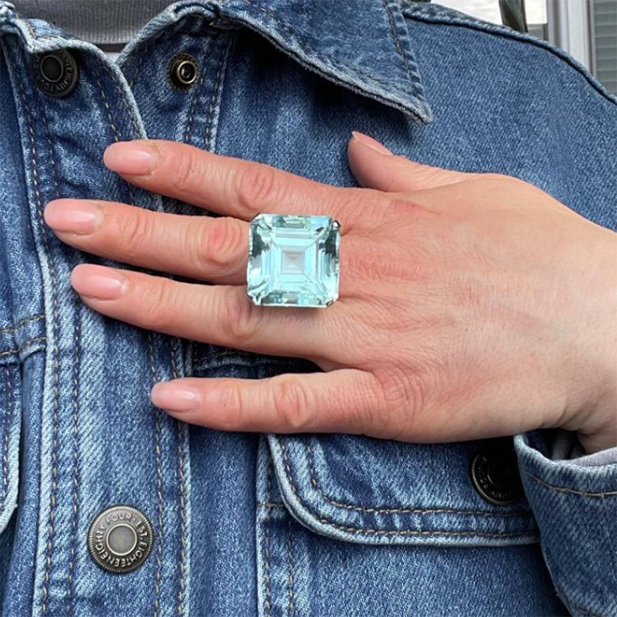18kt White Gold 71.35-Carat Octagonal Step-Cut Aquamarine Ring.

A breathtaking 18kt white gold statement ring, featuring a massive 71.35-carat octagonal step-cut natural aquamarine. The exceptional pale greenish-blue hue and high transparency make