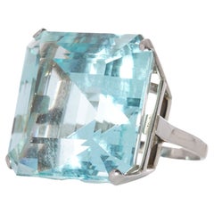 Bague cocktail octogonale taille escalier en aigue-marine certifiée WGI de 71,35 carats
