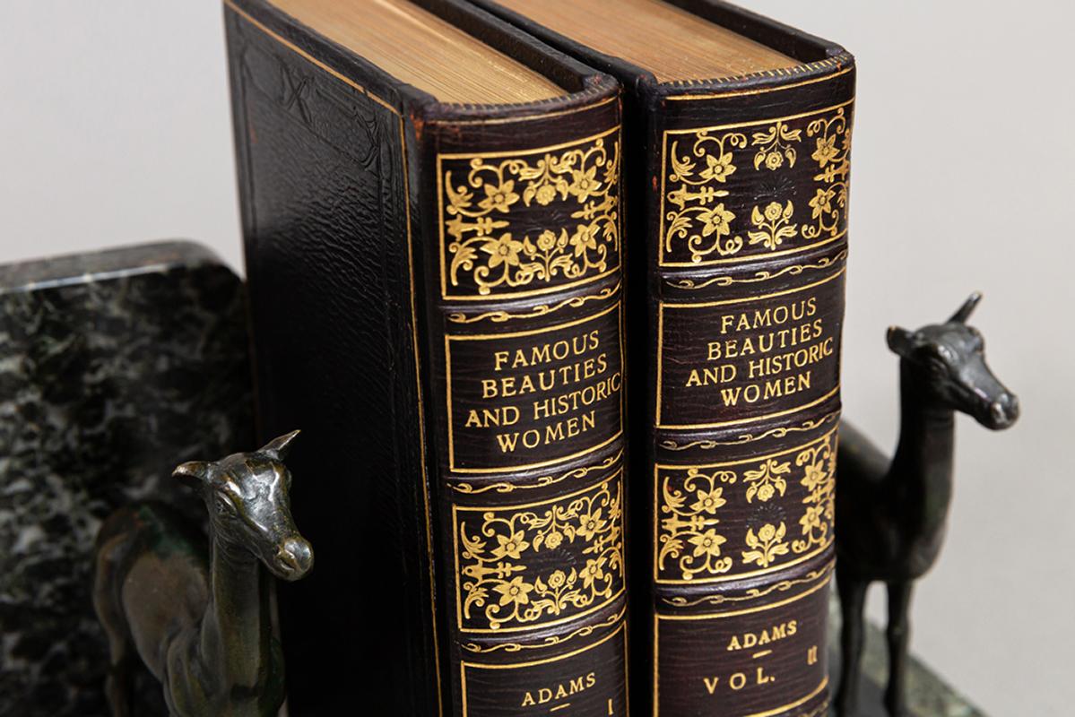 2 Volumes. 

“Extra Illustrated” with many hand colored plates, engravings, prints, photos.
Bound in full black Morocco, all edges gilt, raised bands, ornate gilt on spines.
Published: London: Charles J. Skeet 1865. 
Measures: H 8 inches, D 5