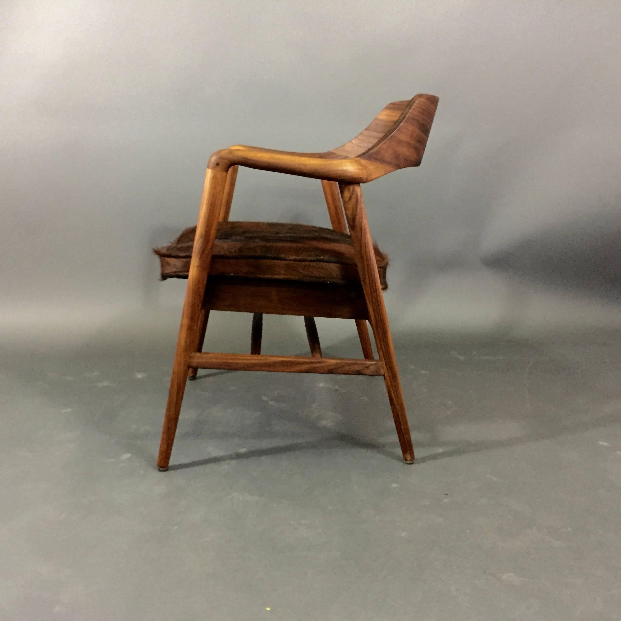 Mid-Century Modern W.H. Gunlocke Sculpted Walnut Armchair, Cowhide, 1960s For Sale