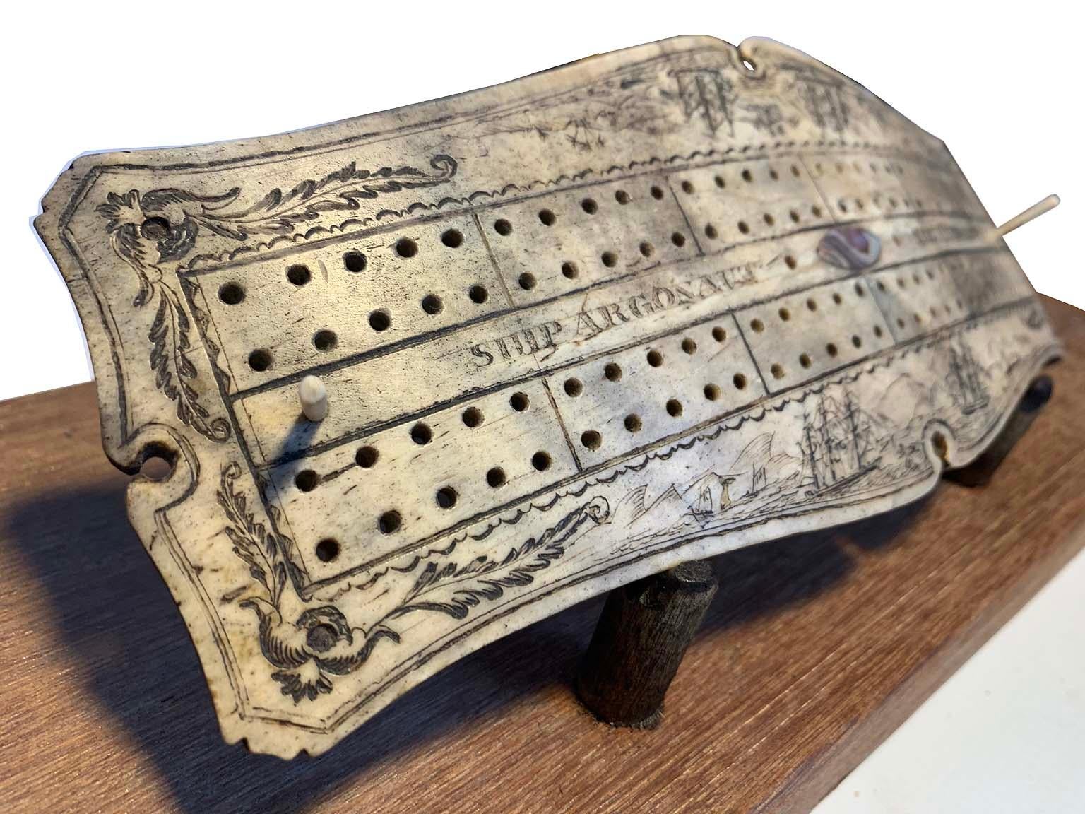 Hand-Carved Sag Harbor Whale Scrimshaw Cribbage Board For Sale