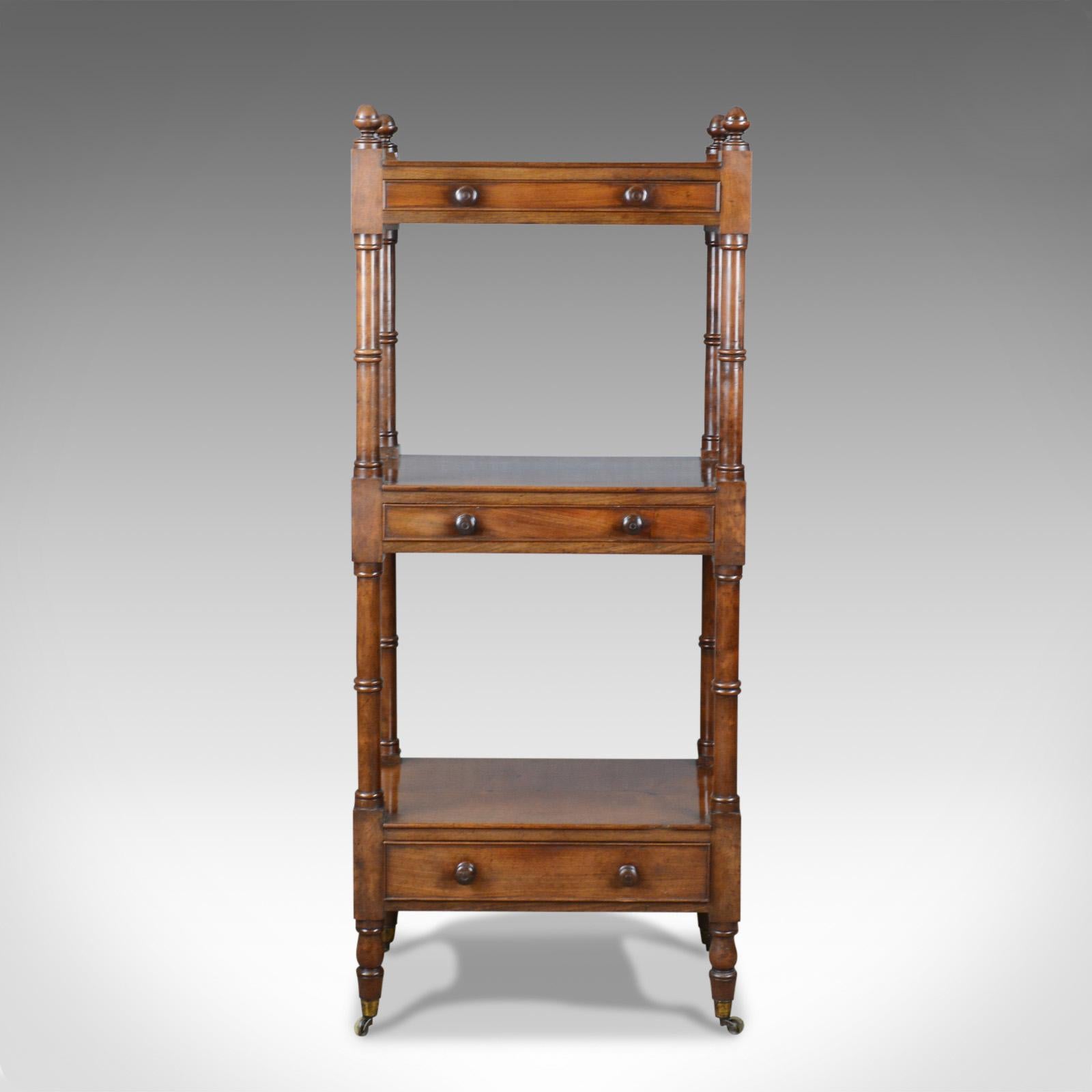 This is an antique whatnot, an English, mahogany, three-tier, Victorian display stand dating to the mid-19th century, circa 1860. 

Delightful, rich, russet tones to the select mahogany
Good consistent colour in the wax polished finish
Grain