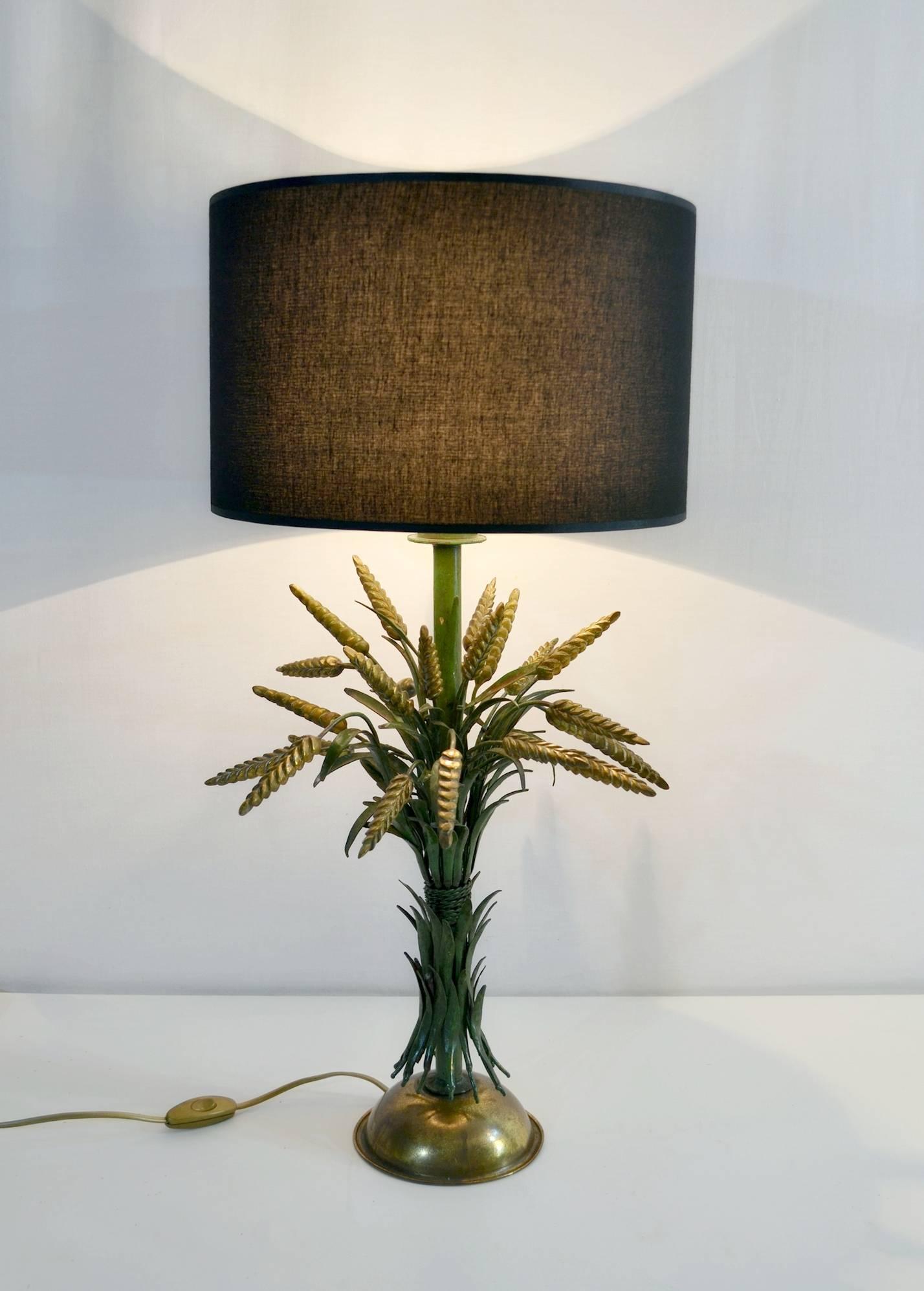 Italian table lamp in form of a wheat sheaf in gold and green with a new drum shade in black fabric.