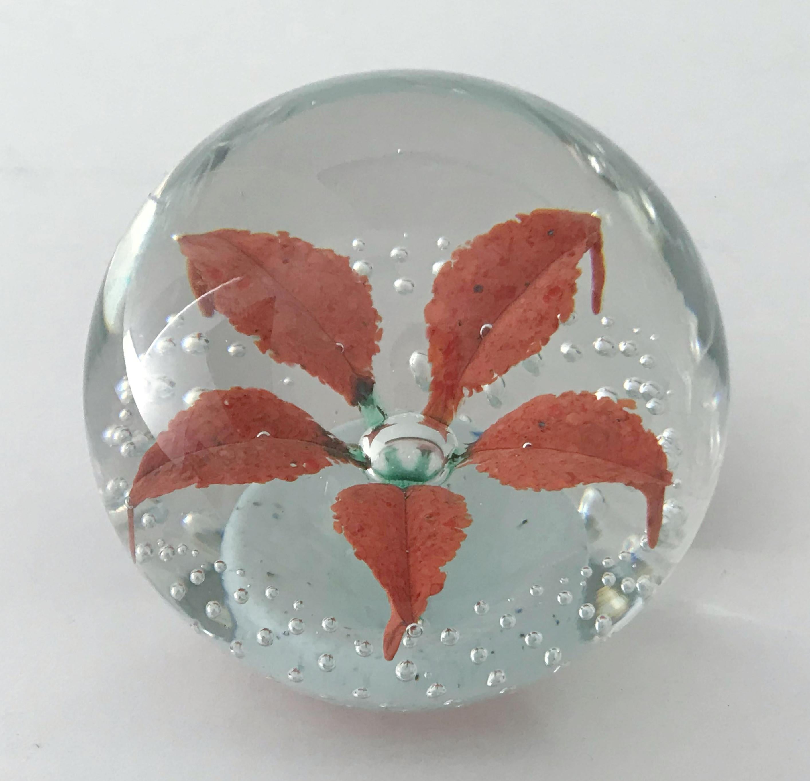 Vintage art glass paperweight with a large hand blown flower with bubbles, made in USA in 1977
Original mark on the base
Measures: Diameter 3 inches, height 3 inches
Order reference #: FABIOLTD G135
This piece makes for a great and unique gift!