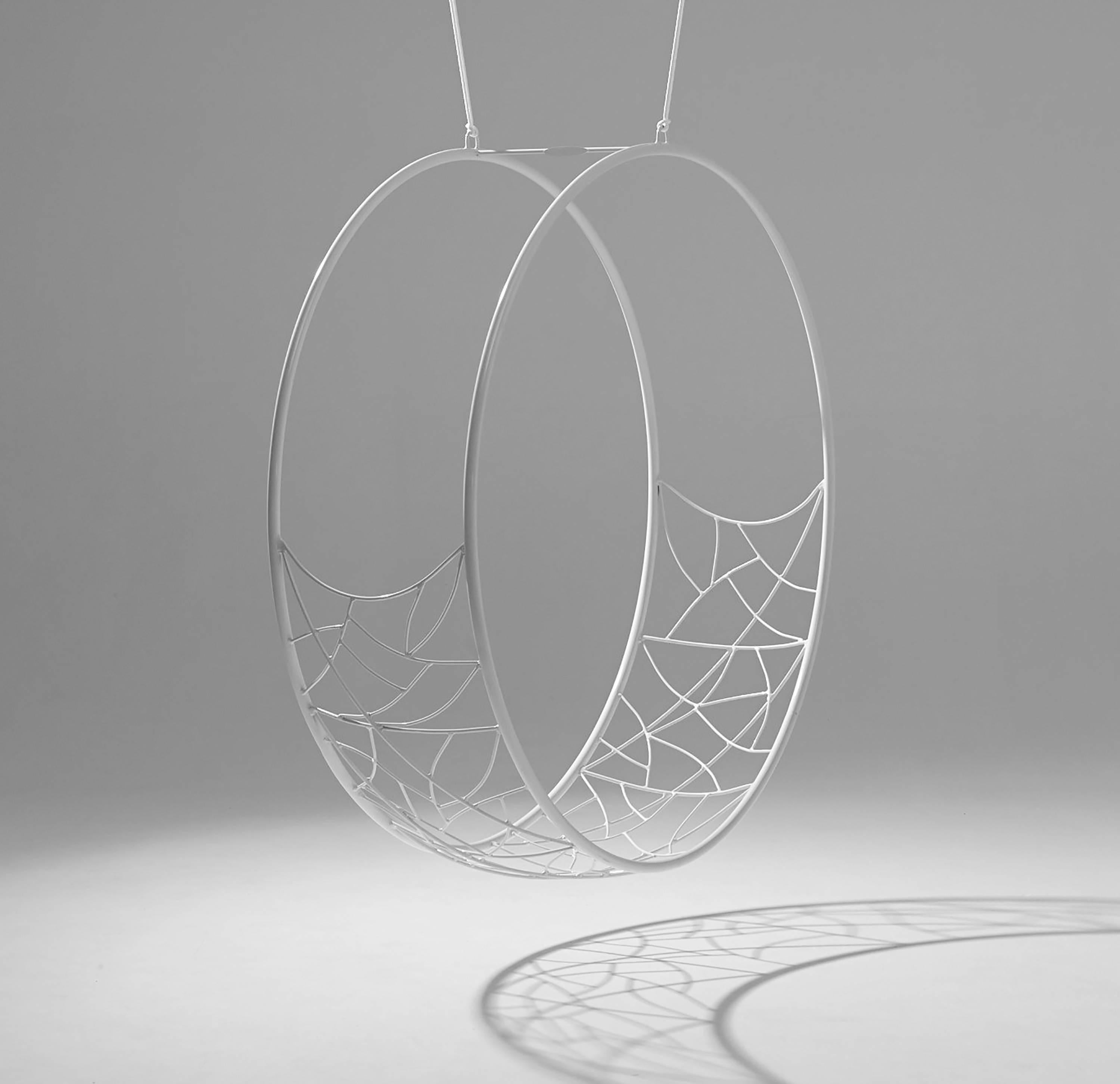 The Wheel hanging swing chair is sculptural and dynamic. Its striking circular shape lends itself for use as a functional art piece.
The pattern detail is inspired by nature and reminiscent of the veins in leaves, tree branches intersecting, the
