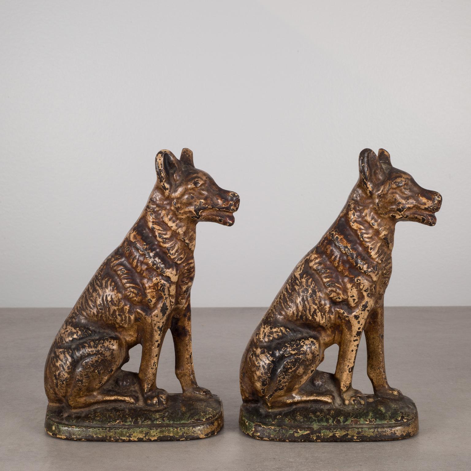 Pair of painted, heavy steel German Shepard bookends with great patina on each.