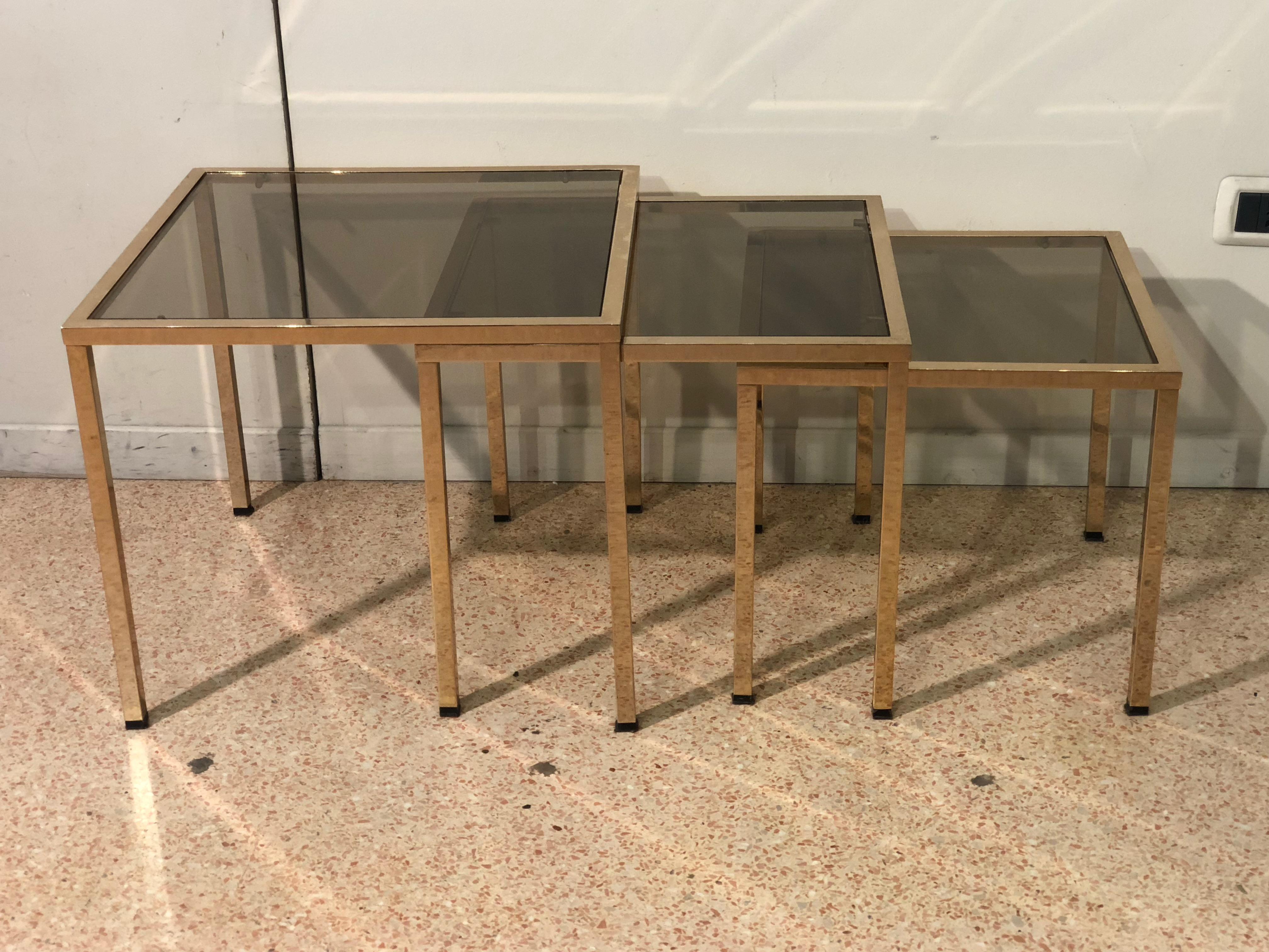 Three small sofa tables to be used together to form geometric fitted compositions or to be divided and spread around a living room or why not, used as nightstands. They are from France from 1970s period, different in height and width. They have