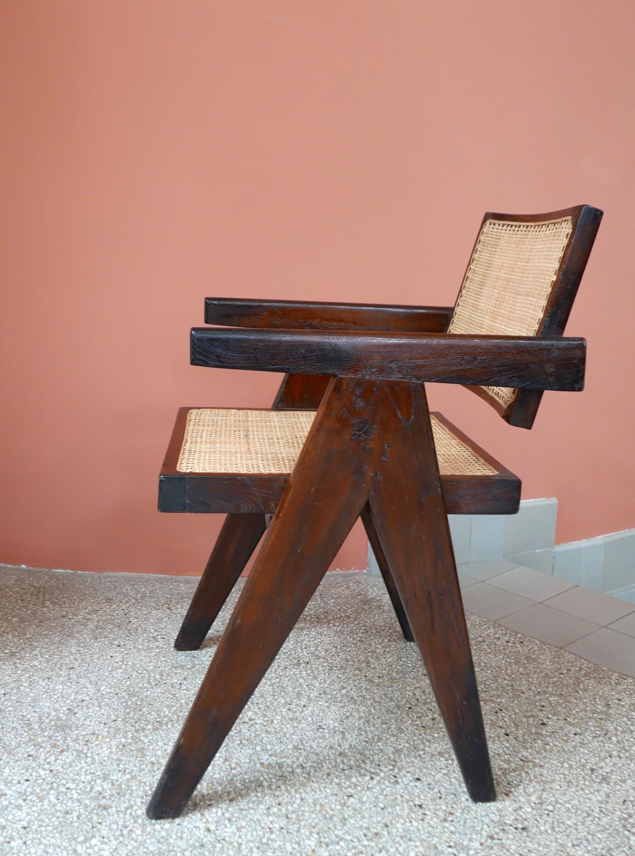 Pierre Jeanneret
PJ-SI-28-A
 “Office cane chair”, circa 1955.
Important : vintage collector's item for sale with guaranteed authenticity. 
Back separated from the seat.
Solid teak, cane.
From Chandigarh India: Architects’Office (1956), Secretariat