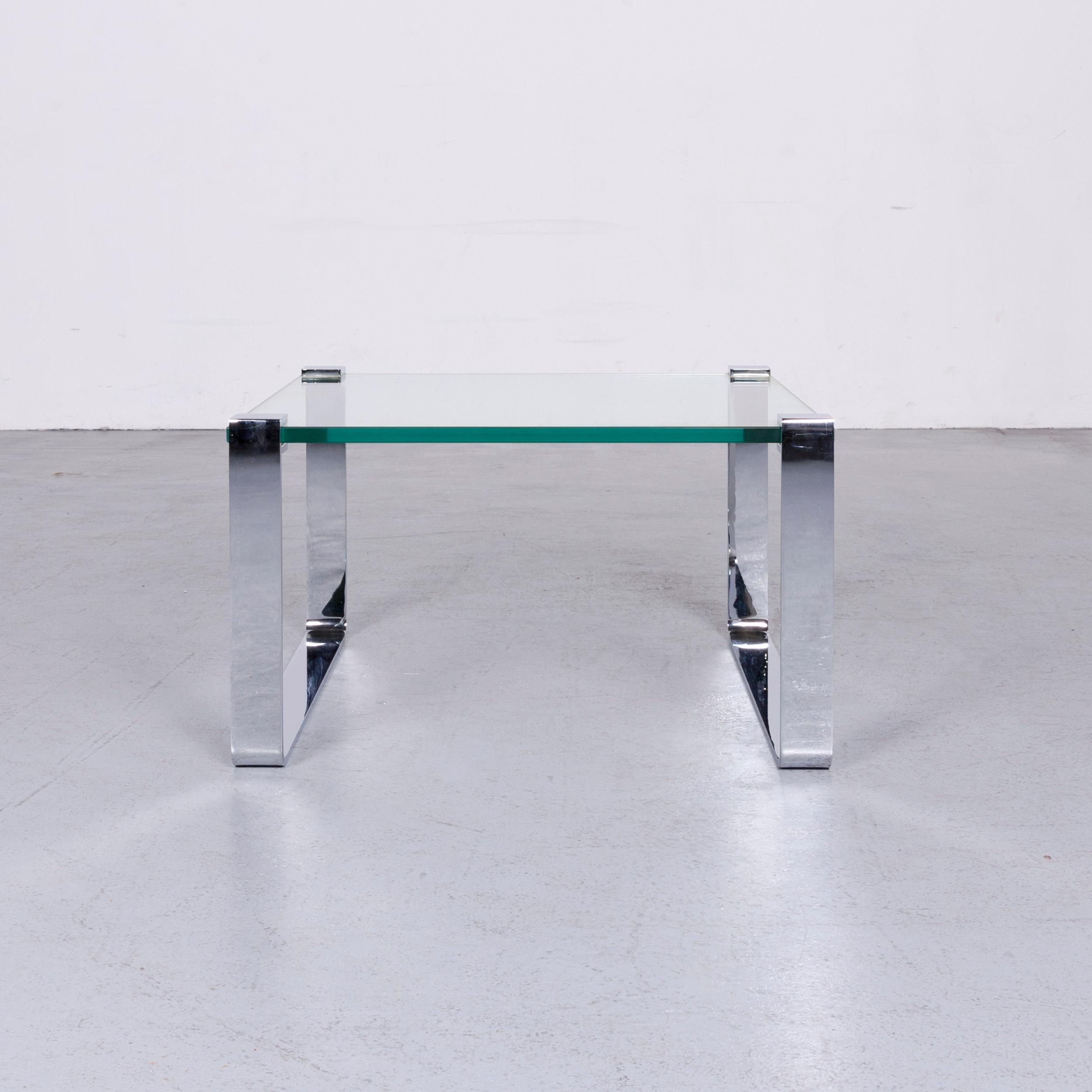 We bring to you an Ronald Schmitt glass coffee table.











  