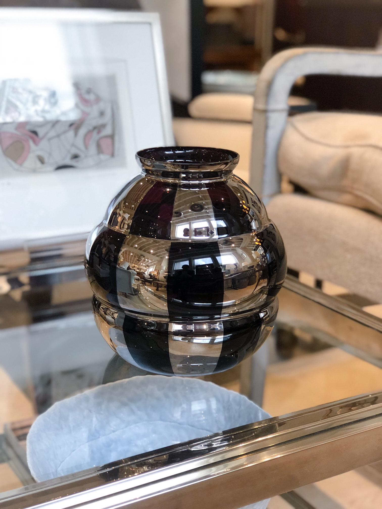 French Art Deco amethyst glass vase with silver, checkered overlay. Signed on bottom, Fanus. France, circa 1930s.

Size: 8” diameter 9” height

In excellent condition - no chips, cracks or loss of silver overlay.

Available to see in our NYC