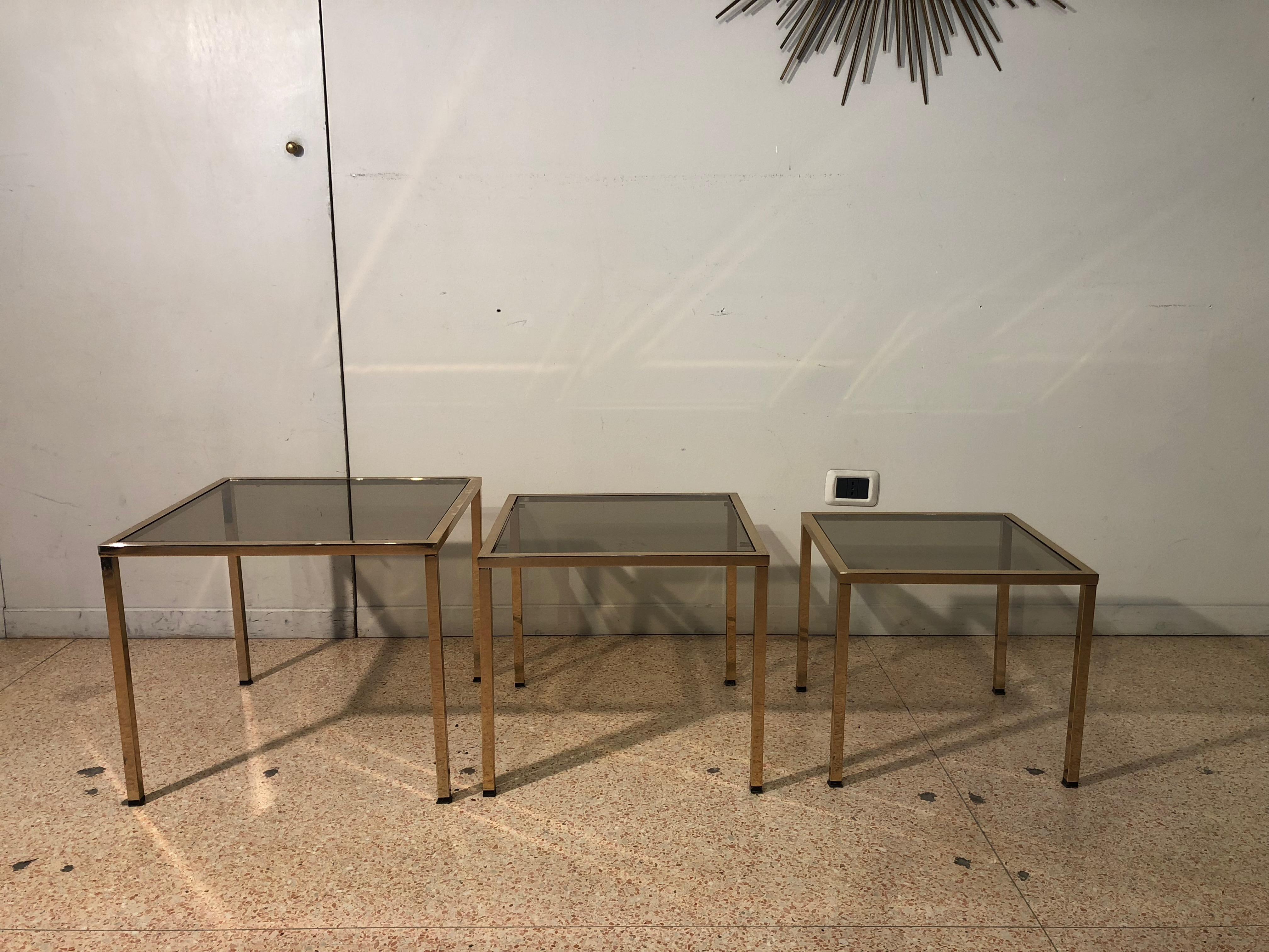 Modern Set of Three Small Gold Brass Structure and Smoked Glass Tables, France, 1970