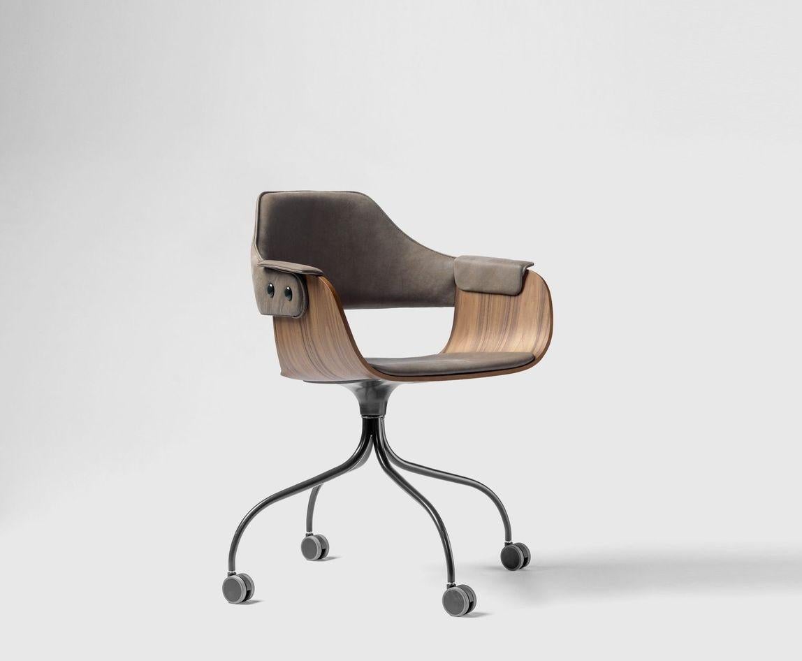 Wheels base showtime chair by Jaime Hayon 
Dimensions: D 55 x W 55 x H 79 cm 
Materials: Powder-coated steel or aluminum structure. Legs, seat, and backrest in plywood with exteriors in natural ash, walnut, or ash stained black. Metallic
