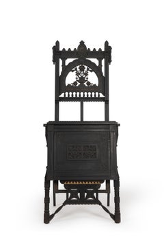 Where Ideas Rest: An Ebonized Easel with Drawing Portfolio, 19th Century
