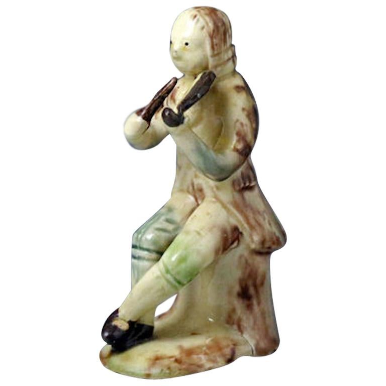 Whieldon-Astbury Pottery Figure of a Violinist Staffordshire, Mid-18th Century