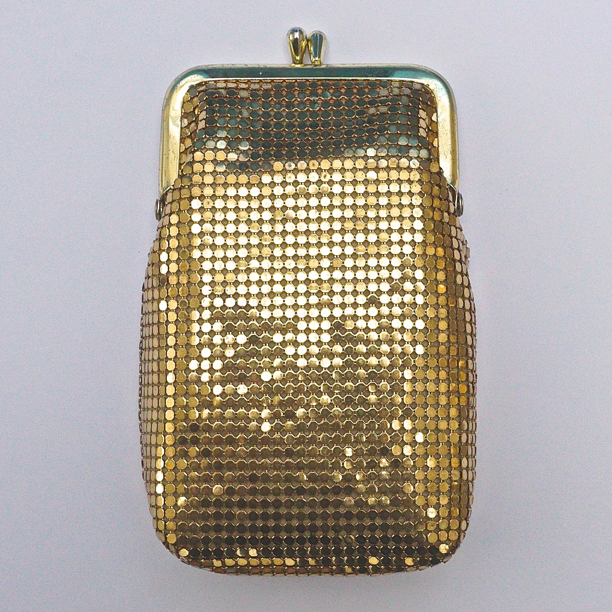 Whiting & Davis beautiful gold mesh purse, and a gold mesh key holder in the style of Whiting & Davis. The purse is length 14cm / 5.5 inches by width 8.5cm / 3.3 inches. The peach lining is in very good condition. The metal fittings have some