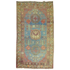 Caprichosa alfombra antigua Khotan azul de principios del siglo XX