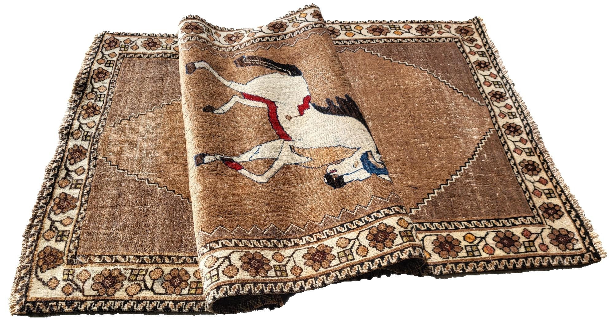 Unique 100 + Year Old Kashkooli Gabbeh

8ft x 3.5ft

Enchanting old pictorial Gabbeh rug, handcrafted by masterful Kashkoolis of the Qashqais. This nomadic treasure features an unusual horse depictation unique to the Nomad who wove it.

Comprised