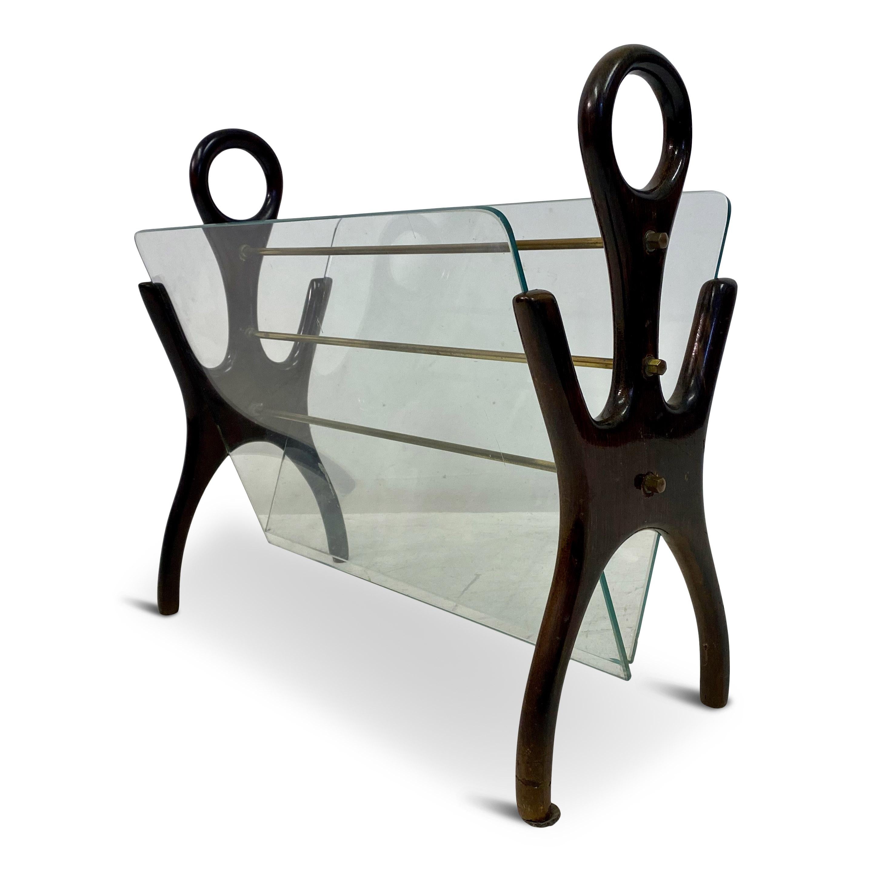 Magazine rack

Wooden frame

Glass shelves

Whimsical shape

Italy 1950s/1960s.