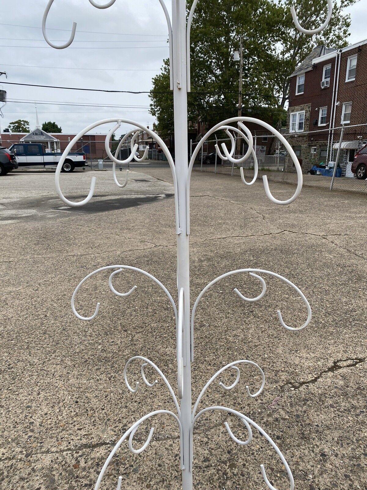 tall white plant stand