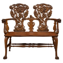 Whimsical Antique Love Seat w/ Carved Faces, Claw Feet & Carved Arms, ca.1900