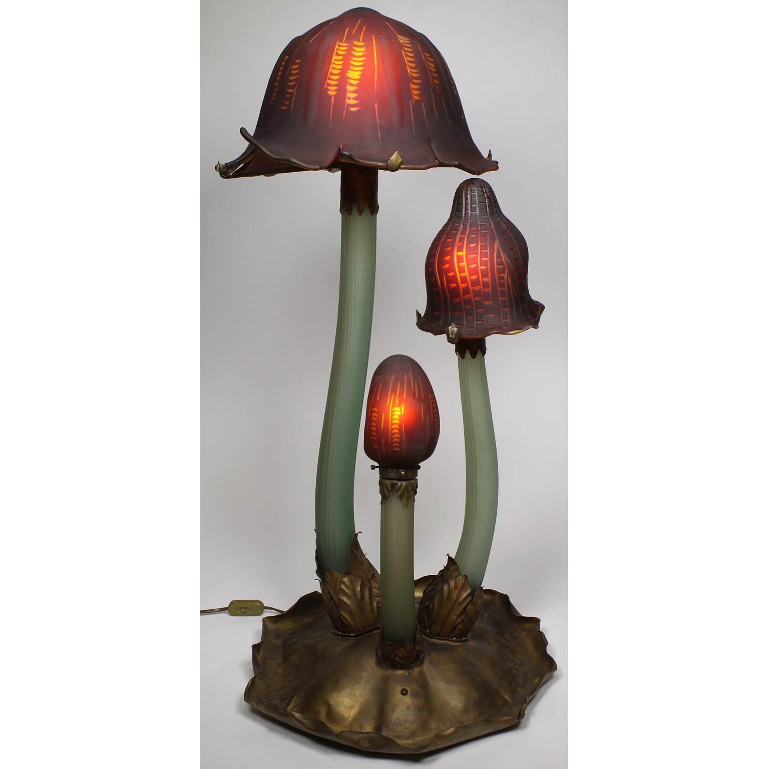 A large French 20th century whimsical Art-Nouveau style mushroom molded glass lamp, after Émile Gallé's 