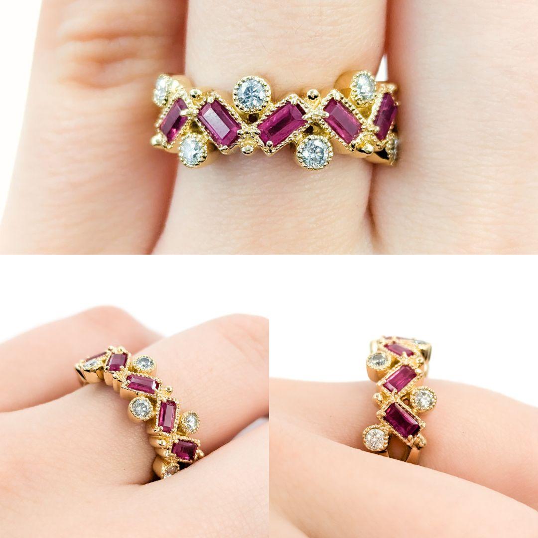 Whimsical Baguette Ruby & Diamond Ring in Yellow Gold

Introducing this beautiful Effy Brand Ruby and Diamond Ring, crafted in 14k yellow gold. The ring features an array of stunning .75ctw baguette rubies and .30ctw round diamonds. The diamonds are