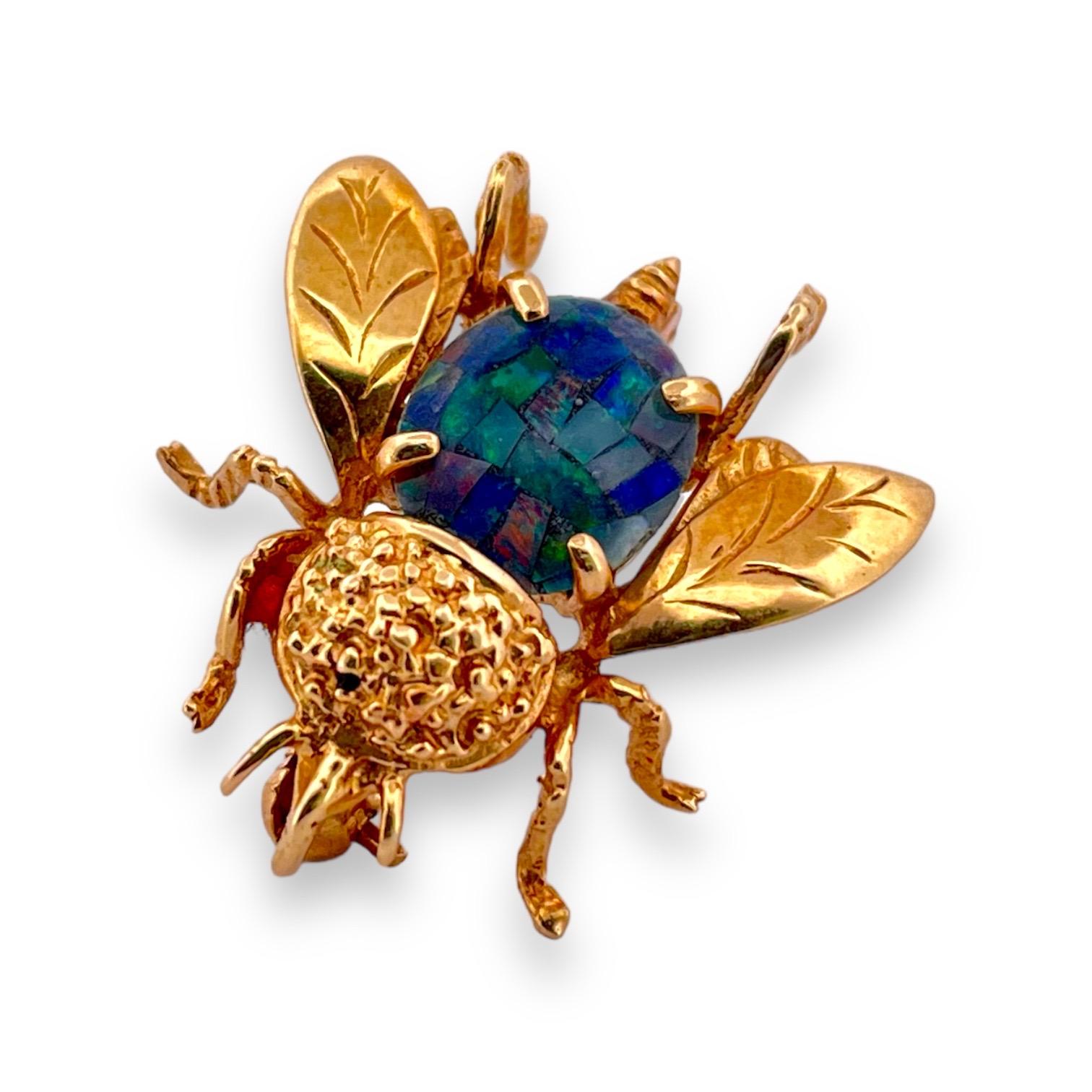 Embrace nature's splendor with this Whimsical Boulder Opal Bee Brooch, finely wrought in the warm embrace of 14K yellow gold. Weighing 2.82 grams, the centerpiece of this enchanting brooch is a vibrant boulder opal, capturing the iridescent magic of