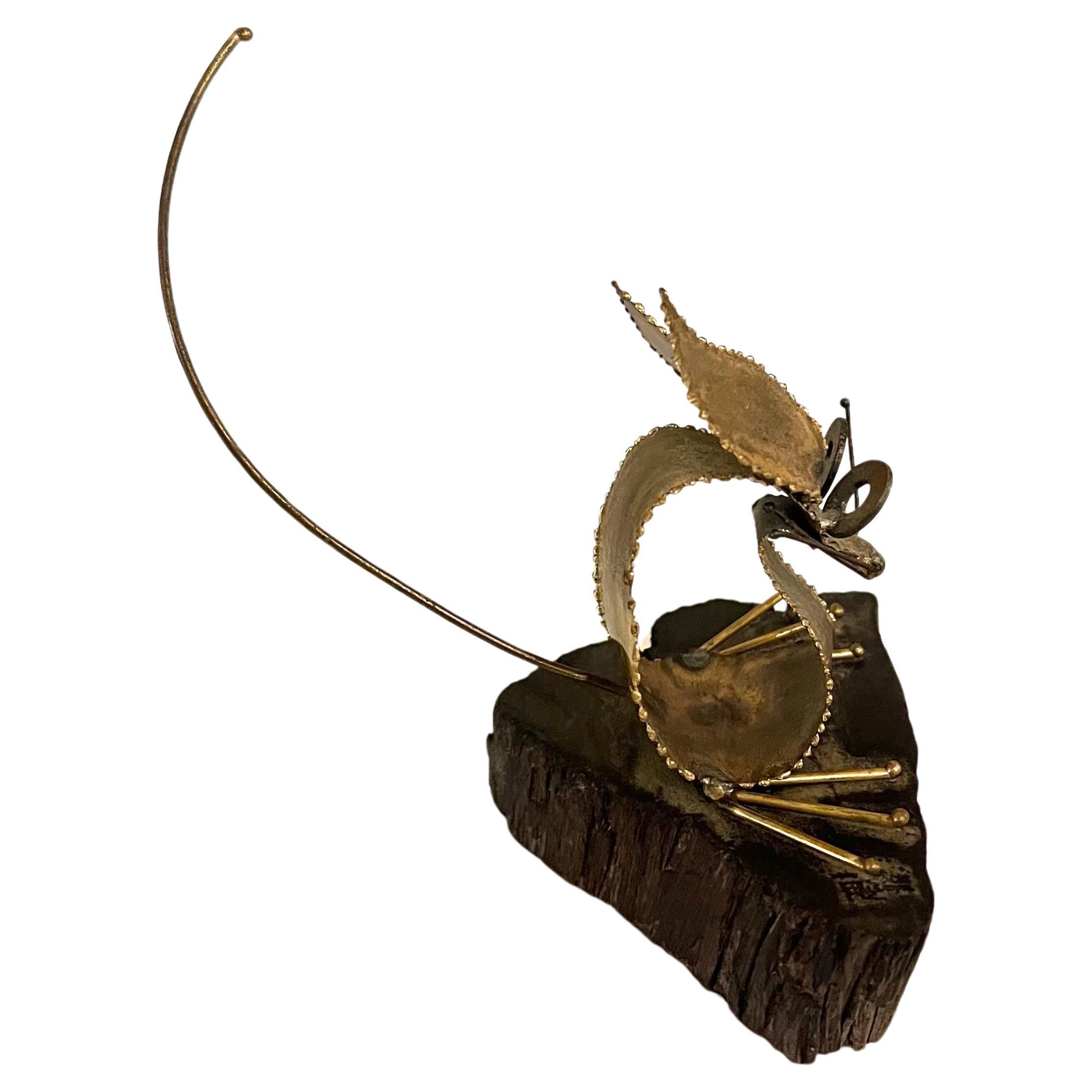 Whimsical petite welded brass sculpture in the style of Curtis Jere circa 1970's.
