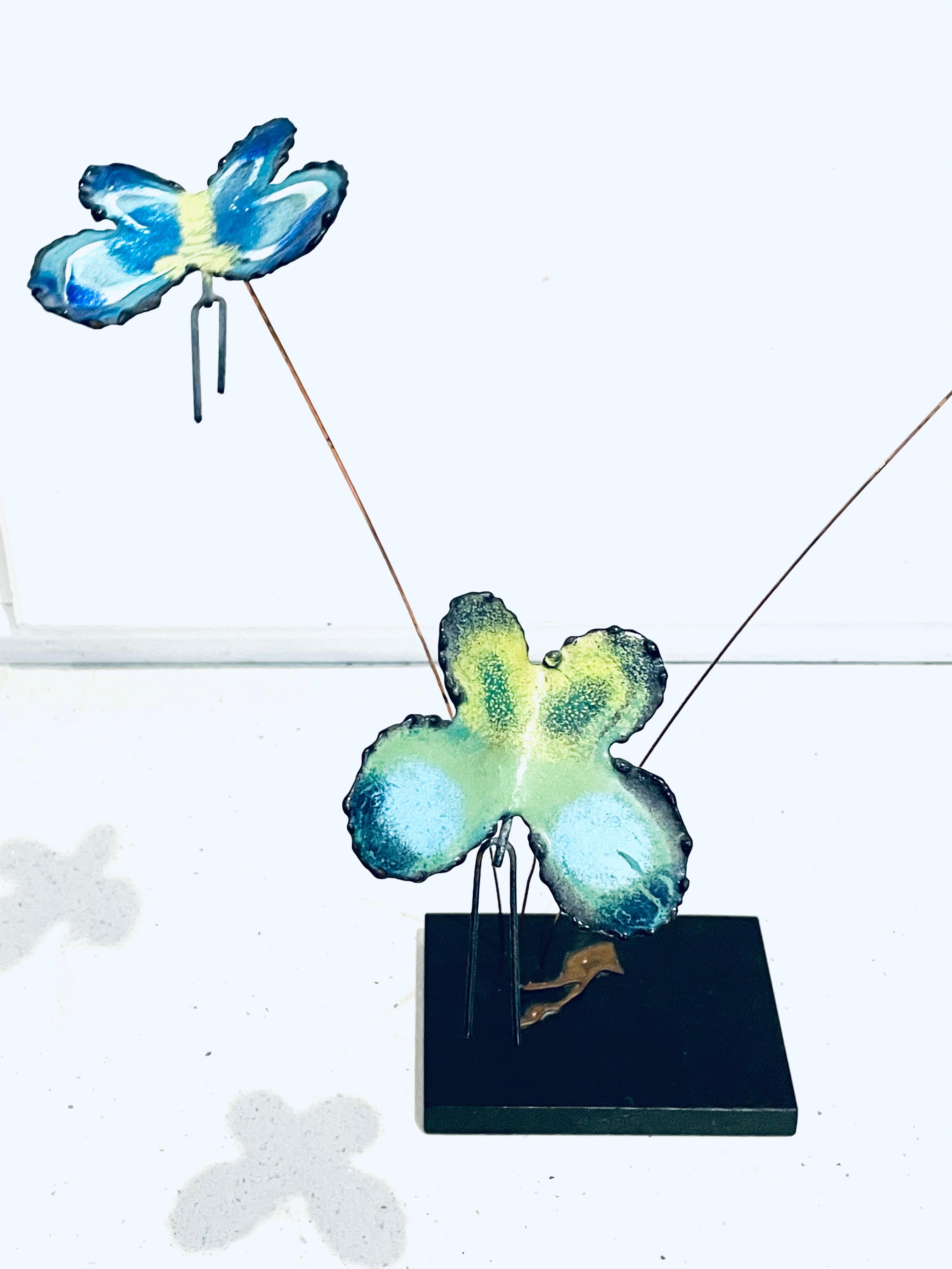 Whimsical butterflies Kinetic sculpture in enameled copper by Curtis Jere, not signed but we had this item before the butterflies move and come off a black painted wood base for easy shipping.